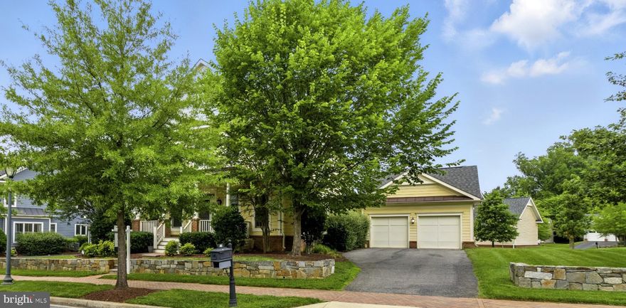 Amazin Price Improvement! Built in 2012, this beautiful and charming Victorian-style home is located in the prestigious Chestnut Lodge community of historic Rockville. Nestled within the charm of the historic Town of Rockville, this property offers not only a peaceful suburban setting but also unbeatable proximity to the vibrant Town Center. Enjoy being just a 10-minute walk from an array of local favorites—restaurants, cafés, the Rockville Library, seasonal outdoor performances, and even the popular ice skating rink in the winter season. 

The main level welcomes you with a dramatic 10-foot foyer, formal living and dining rooms adorned with crown molding, tray ceilings, and decorative columns—perfect for entertaining. The open-concept floor plan flows into a gourmet kitchen featuring granite countertops,  40-inch high-end cabinets, a large center island, and stainless steel appliances. Just off the kitchen is a cozy family room with a fireplace, offering the ideal setting for casual evenings or quiet mornings.   A bonus office or library area overlooking the family room can be easily converted into a quiet home office or music room. 

Upstairs, you'll find four well-sized bedrooms—two of them with en-suite baths and walk-in closets. The primary suite is a true retreat with its own seating area, two large walk-in closets, and a luxurious bath complete with a soaking tub, dual vanities, and a separate shower. The upper-level laundry room adds everyday convenience.

The fully finished walkout basement is impressively spacious, with an oversized recreation room, large seating area, a den (perfect as a guest suite or home office), a full bathroom, and a separate exercise room. Whether it’s movie nights, gym time, or working from home, this level offers endless possibilities.

Outside, the home sits on a beautifully landscaped quarter-acre lot with mature trees, a wide front porch, a stone retaining wall, a private driveway, and a detached two-car garage.

Inside, the home blends timeless architecture with modern comforts. The community is known for its friendly atmosphere and walkability, making it perfect for those who value connection and convenience. Commuters will appreciate quick access to major highways (I-270 and MD-355), making travel to DC and surrounding areas seamless.

With its blend of timeless charm, functional design, and unbeatable location, 126 Bullard Circle offers a rare opportunity in one of Rockville’s most walkable and desirable neighborhoods.