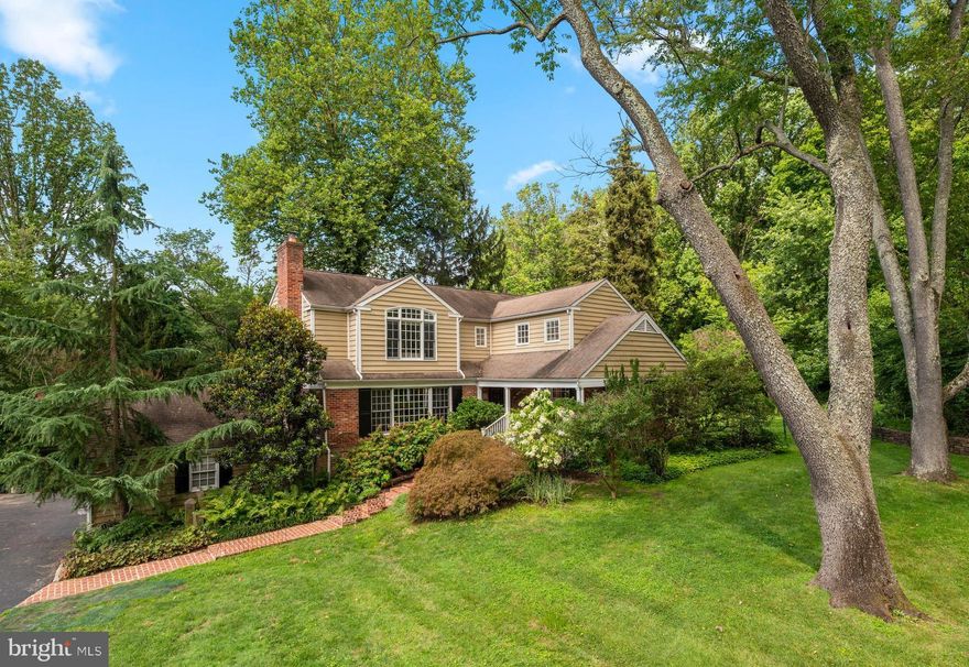 Welcome to 211 Spruce Tree Road in Radnor - a spacious 5 Bedroom, 4.5 Bath home set on a private, picturesque lot in top-ranked Radnor School District. Tucked into a quiet, walkable neighborhood, this property features a sweeping lawn, sparkling pool (separately fenced so kids and pets can enjoy the yard safely), and stunning specimen plantings. The inviting main level offers an open flow from the Kitchen to the Family Room, plus gracious Living and Dining Rooms, a private Office, and a convenient main floor Guest Bedroom Suite with en suite Full Bath. Upstairs, the expansive Primary Bedroom Suite includes a soaring vaulted ceiling, large windows, custom walk-in closet with organizers and a spacious en suite Full Bath with double vanity, jetted tub, and separate shower. Three additional Bedrooms share a generous Hall Bath with double vanity and tub/shower combo. The Lower Level features a walk-out, daylight Recreation Room, 4th Full Bathroom, and a Bonus Room which could be used as a 2nd Office, Workout Room, Hobby Room, or for an Au Pair.  Enjoy outdoor dining and scenic views of mature landscaping from the rear deck.  Ample storage space is found in the oversized, extra deep, 2-car Garage, unfinished lower level Utility Room, and the large garden shed. Convenient location, just minutes from train stations, shopping & restaurants in the vibrant town of Wayne, corporate/medical centers, and major commuting routes to Center City and the Airport.  No open houses are planned at this time, but listing agents would be happy to help agents/buyers get an appt.