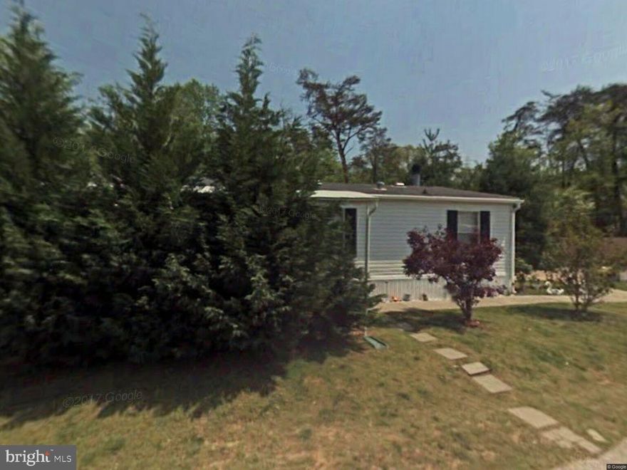 Back on the market.  Financing fell through.  Large 3 bedroom, 2 bath manufactured home in Wayson's Woods.    Recently renovated with HVAC, roof and water heater.   New hardwood floors throughout.      Has one of the best lots in the community.  A very nice, peaceful community with basketball courts, playground, picnic areas, and boat ramp.