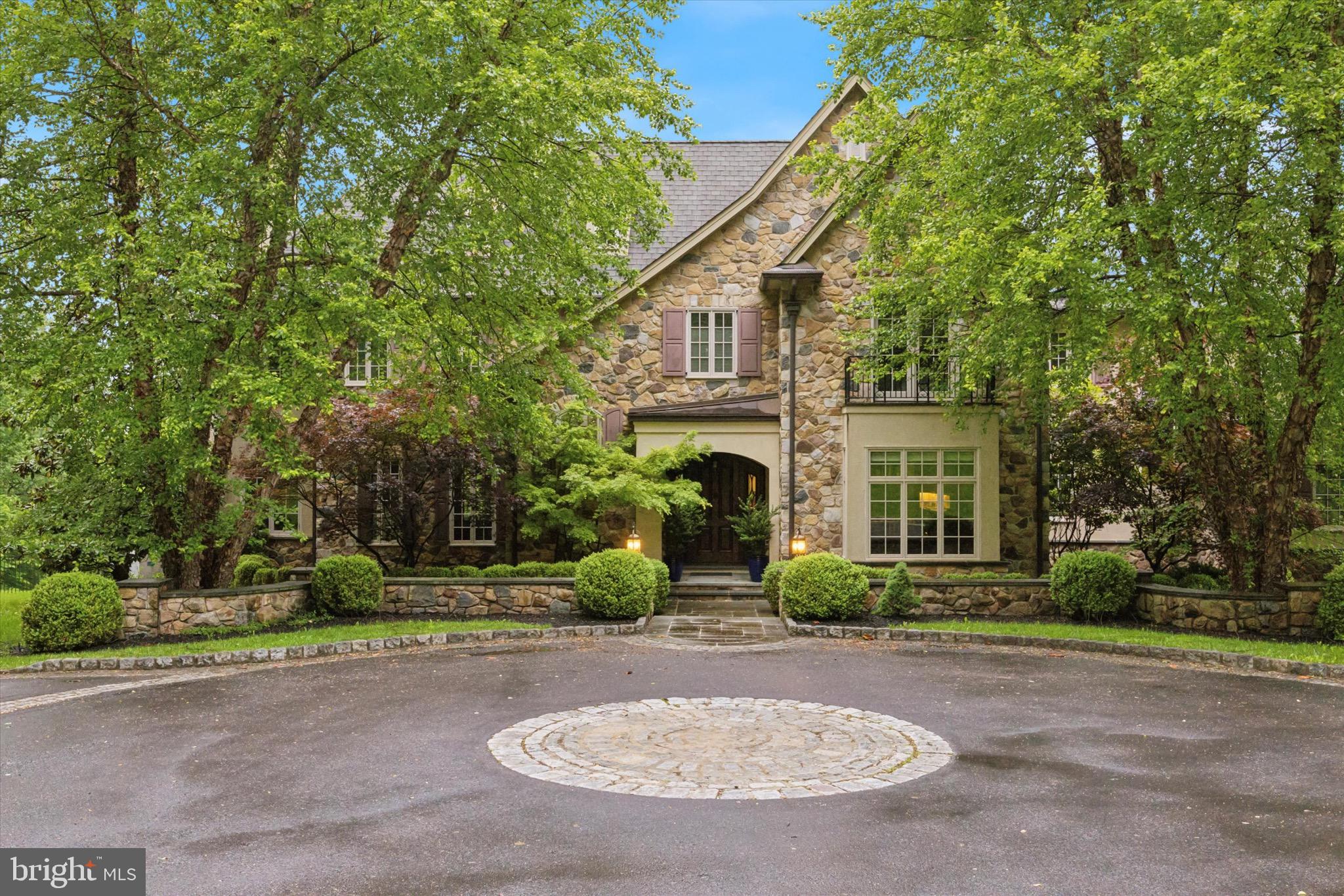631 Harts Ridge Rd, Conshohocken, PA 19428
Offered for Sale – A True Private Estate Oasis
Step into a world of luxury at this absolutely stunning estate, nestled on the prestigious Harts Ridge Rd in Conshohocken. This architectural masterpiece offers 5 bedrooms, 5 full bathrooms, and 3 half bathrooms, with each detail designed to impress even the most discerning buyer.
From the moment you enter, you’ll be captivated by the open and elegant layout. The main floor boasts a chef’s dream kitchen with heated floors, top-of-the-line appliances, and a massive center island, seamlessly flowing into a spacious living area adorned with a floor-to-ceiling window wall that floods the home with natural light and showcases breathtaking views of the property.
Each of the five bedrooms features its own luxurious en-suite bathroom with radiant heated floors, providing unparalleled comfort and privacy. Throughout the home, custom finishes, soaring ceilings, and abundant windows create a light-filled, contemporary atmosphere.
Entertainment and wellness take center stage with a private movie theater, fully equipped gym, sauna, wet bar, and additional kitchen areas perfect for gatherings and hosting. The entire home is integrated with a premium surround sound system, delivering audio perfection in every room.
Step outside to your personal resort-style backyard, featuring a saltwater pool, professional landscaping, and serene outdoor spaces designed for both relaxation and entertaining.
Additional features include:
Back-up generator capable of powering the entire home
Commercial-grade drainage system surrounding the property
Tesla solar panels (fully owned) providing 53% of the home’s energy
5-car garage with electric car charging station
This is more than just a home—it's a lifestyle. Don’t miss your chance to own one of the area’s most remarkable residences.