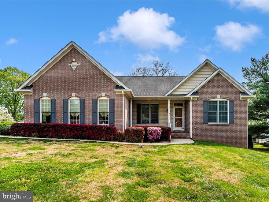 **Best and Final due Monday 5/4 10am** Welcome to 6117 Old Washington Rd.  in beautiful Sykesville, MD! With a combination of  brick and siding exterior, this meticulously maintained 3-bedroom, 2-bath rancher offers 2,097 sq ft  above ground of comfortable, single-level living on a spacious 0.53-acre lot.  The hallway is finished in wood-like LVP flooring, adding warmth and continuity to the home's flow.  The HUGE family room features Berber carpet, abundant natural light, and a cozy propane fireplace—perfect for relaxing or entertaining. 
The eat-in kitchen, fully renovated in 2019, is a chef’s dream with LVT flooring, solid surface countertops, stainless steel appliances, double oven, propane cooktop, and generous cabinet storage—including a built-in filing system for added functionality. From the kitchen, step out onto the composite deck with vinyl handrails, ideal for grilling or enjoying your morning coffee. A formal dining room with a pocket door provides flexible space for gatherings or a home office setup. The spacious primary bedroom features a large closet with built-in shelving, while the primary bathroom impresses with double sinks, a soaking tub, fully updated tile shower, ceramic tile floors, and a custom built-in cabinet. Both additional bedrooms are large and include closets with built-in shelving.  The second full bath offers a tub/shower combo with ceramic tile flooring. Major systems are thoughtfully updated and include: Propane heat with a new furnace (2015), Electric A/C heat pump (2022), Propane hot water heater, whole-house propane generator (2023), water softener & filtration system, and even a Radon remediation system.
Located just minutes from historic downtown Sykesville, named “Coolest Small Town in America”, you’ll enjoy easy access to quaint shops, cozy cafes, restaurants, and farmers markets. Spend weekends exploring Piney Run Park and the Sykesville Rail Trail.  Commuters will appreciate proximity to major routes and easy access to Baltimore or Frederick. This beauty is truly move-in ready, and you won't be disappointed!
