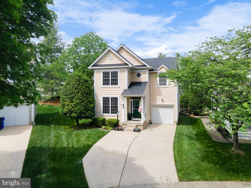 Offer Deadline Sun May 12th 5pm: Situated on a peaceful tree-lined cul-de-sac street, this meticulously crafted property offers a blend of comfort, craftsmanship, and natural beauty. This thoughtful design, spans nearly 3000 sqft, welcoming you with a covered porch and a custom doorway. Inside, the charm continues with hardwood Maple flooring, 9-foot ceilings, and crown molding, creating a warm and inviting atmosphere. The main level features a spacious open floor plan, perfect for everyday living and entertaining. The 2-story dining room adds character with its wall stacked 3M-filmed UV light protected windows, that flood the space with sunshine. The adjacent gourmet kitchen boasts top-of-the-line amenities including Stainless Steel appliances, Double Flex Oven, Prep Sink and a convenient eat-in island where culinary creations come to life. The Living area and cozy gas fireplace flow seamlessly through a newer glass slider(2019) that opens onto a large maintenance-free deck. Savor the fire pit and tranquility of the landscaped fully fenced backyard with friends and family.  On the upper level retreat to the luxurious primary bedroom suite, complete with a cathedral ceiling, expansive walk-in closet, and a spa-like ensuite bathroom boasting a large soaking tub and glass-enclosed shower(both full upper baths new 2020). In the finished lower level, you can mix a treat for your guests at the wet bar, and enjoy the game in this additional entertainment space. The lower level includes a FULL BATH, EGRESS WINDOW and a side flex room perfect for an office or SLEEPER SOFA. New Gas Furnace Dec 2023. Solar Water Heater System saves $$$! Direct access to nearby hiking trails and close proximity to all that Columbia MD has to offer including pools, parks, shopping and great dining! A Commuters dreams with major routes minutes away. The details you seek are already done..WELCOME HOME!