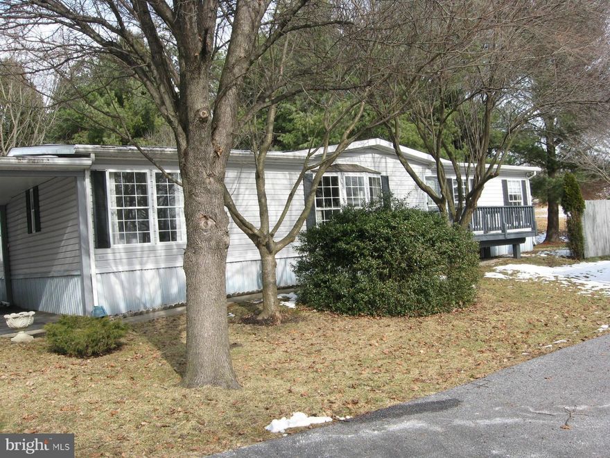 PRE-APPRAISED!Beautifully maintained double wide mobile home. New kitchen with appliances(refrig.TB replaced) & new floor. Master BR + 2 more BR's separated by large living room. Large windows makes the house bright & sunny. Heated back steps lead to large deck from carport. Roof & skylights 7 years old  Lace curtains excluded.Ground rent is $587 & includes water,sewer,taxes, snow & trash removal.