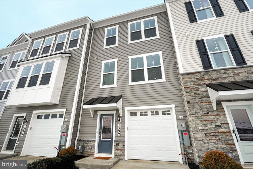 **OFFERING UP TO $20K IN CLOSING COST ASSISTANCE WITH USE OF APPROVED LENDER AND TITLE.** 
The only brand new homes in Frederick, MD backing to Ballenger Creek Park with no City Taxes! Welcome home to Park Place at Ballenger Creek! The Bradford floorplan is an inviting townhome thoughtfully designed with versatility and functionality in mind. This home is 1,818 square feet with 3 bedroom and 3.5 baths! Enter with ease through the welcoming front door or enjoy the convenience of direct access from the attached garage. On the lower level, a bright, finished recreation room awaits as well as a full bath with walk in shower and seat! On the main level, everyday living unfolds with an open-concept kitchen with center island and dedicated dining area. At the heart of it all is the spacious living area with plenty of space to sit back and relax! On the upper level, a luxurious primary suite features an ensuite bathroom complete with dual vanity, and seated shower. For added convenience, the laundry room is positioned on the upper level as well as two secondary bedrooms and hall bath.
Park Place, is a premier, boutique townhome community now selling in Frederick, Maryland! Whether you thrive in a bustling urban atmosphere or prefer a peaceful escape near the mountains, this community offers a variety of lifestyle choices, making it an ideal place to call home. Nestled beside Ballenger Creek Park, a public amenity offering athletic fields, nature trails, picnic pavilions, playgrounds, a dog park, and a community garden, Park Place residents will enjoy endless recreation just beyond their doorstep. The community is conveniently positioned just minutes from historic Downtown Frederick, a dining and retail district known for its wholesome culture, and I-270, a major commuter route connecting Frederick residents to the vibrant metropolitan region.