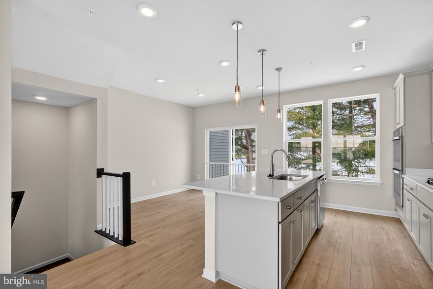 **OFFERING UP TO $20K IN CLOSING COST ASSISTANCE WITH USE OF APPROVED LENDER AND TITLE.** 
The only brand new homes in Frederick, MD backing to Ballenger Creek Park with no City Taxes! Welcome home to Park Place at Ballenger Creek! The Bradford floorplan is an inviting townhome thoughtfully designed with versatility and functionality in mind. This home is 1,818 square feet with 3 bedroom and 3.5 baths! Enter with ease through the welcoming front door or enjoy the convenience of direct access from the attached garage. On the lower level, a bright, finished recreation room awaits as well as a full bath with walk in shower and seat! On the main level, everyday living unfolds with an open-concept kitchen with center island and dedicated dining area. At the heart of it all is the spacious living area with plenty of space to sit back and relax! On the upper level, a luxurious primary suite features an ensuite bathroom complete with dual vanity, and seated shower. For added convenience, the laundry room is positioned on the upper level as well as two secondary bedrooms and hall bath.
Park Place, is a premier, boutique townhome community now selling in Frederick, Maryland! Whether you thrive in a bustling urban atmosphere or prefer a peaceful escape near the mountains, this community offers a variety of lifestyle choices, making it an ideal place to call home. Nestled beside Ballenger Creek Park, a public amenity offering athletic fields, nature trails, picnic pavilions, playgrounds, a dog park, and a community garden, Park Place residents will enjoy endless recreation just beyond their doorstep. The community is conveniently positioned just minutes from historic Downtown Frederick, a dining and retail district known for its wholesome culture, and I-270, a major commuter route connecting Frederick residents to the vibrant metropolitan region.