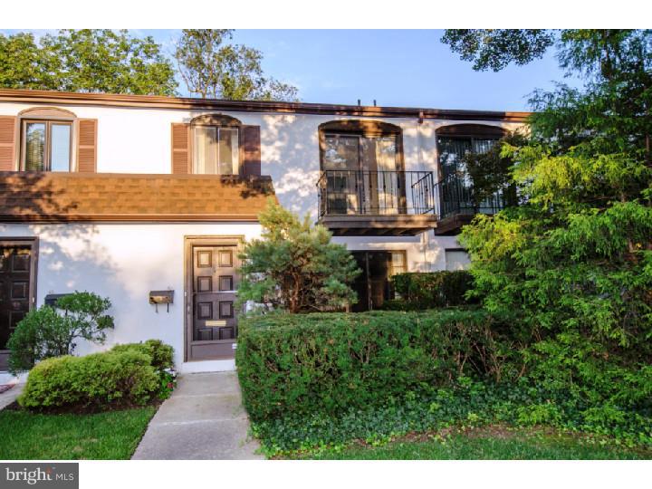 Motivated Seller says "make an offer!" If you need to be minutes away from commuting routes, shopping and schools, yet you crave the privacy of a park-like setting, Bryn Mawr Place is for you! This unit faces the beautifully maintained grounds, yet is just a few steps from the parking area. Open plan living and dining rooms lead to spacious eat-in kitchen with fireplace. Sliding doors in the front and back lead to front and back patios. Large master suite with plenty of closet space features balcony overlooking the park. Second bedroom also offers plenty of room plus additional closet space. Extra-large walk-in hall closet completes the second level. Main floor laundry. Newer A/C. Cable- and Fios-ready. Walking distance from Norristown High-Speed Line. Recognized by the PA and Delaware Chapter of the Community Associations Institute as a Gold Star Community, Bryn Mawr Place consistently demonstrates excellence in community participation, maintaining standards, fiscal stability, and the improvement of quality of life for its residents. Low monthly fee includes trash, water and exterior maintenance. Don't miss it!