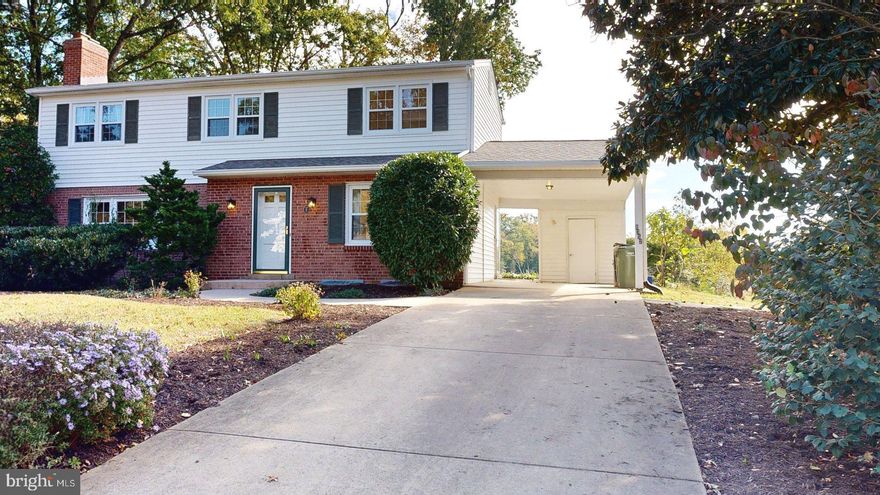 Spectacular waterfront on the peaceful shores of Little Hunting Creek, this Mount Vernon estate offers an unmatched combination of elegance, lifestyle, and navigable access to the Potomac River. The home impresses with a gourmet kitchen featuring brand new Quartz Calacatta Nile countertops, sink, faucet and a new refrigerator, seamlessly blending elegance and functionality for memorable gatherings and daily living. The spacious main level captures tranquil water views from the living and dining areas, while four generously sized bedrooms upstairs provide luxurious retreats with hardwood flooring and ample closet space. Updated bathrooms combine contemporary finishes with timeless elegance. Step outside to your private dock with direct access to the navigable creek, leading seamlessly to the Potomac River, ideal for boating, fishing, or simply relaxing by the water. Mature trees and lush landscaping create a peaceful, natural setting, and the home has been professionally power-washed and landscaped. The dock power washed and freshly stained. Located just over a mile from the George Washington Parkway and the historic Mount Vernon Estate, with convenient access to Old Town Alexandria, Fort Belvoir, and major commuter routes, this property offers the perfect balance of tranquility, sophistication, and accessibility.