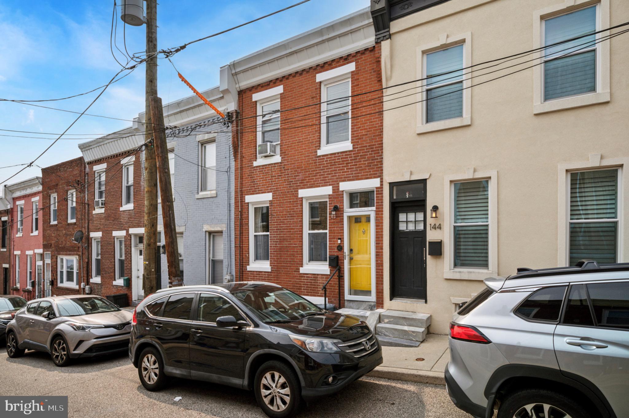 Step into this beautifully updated brick rowhome in the heart of Manayunk and enjoy the perfect blend of charm and modern living. Gleaming hardwood floors flow throughout the open main level, where exposed brick, high ceilings, and stylish finishes create a warm, inviting atmosphere. The kitchen is a showstopper with upgraded cabinetry, butcher block counters, subway tile backsplash, stainless steel appliances, and a walk-out to a private deck—ideal for morning coffee or evening entertaining.
Upstairs, the spacious primary bedroom impresses with tall ceilings, hardwood floors, and a ceiling fan for year-round comfort. A versatile middle room makes the perfect home office, nursery, or flex space, while the updated bathroom shines with timeless subway tile and bold graphic floor tile. A generous third bedroom completes the upper level.
The full basement offers a Speed Queen washer and dryer, abundant storage, and potential to be finished for even more living space.
Located in one of Philadelphia’s most sought-after neighborhoods, this home is a true gem—steps from Manayunk’s vibrant shops, dining, and trails, yet a serene retreat when you’re ready to unwind.