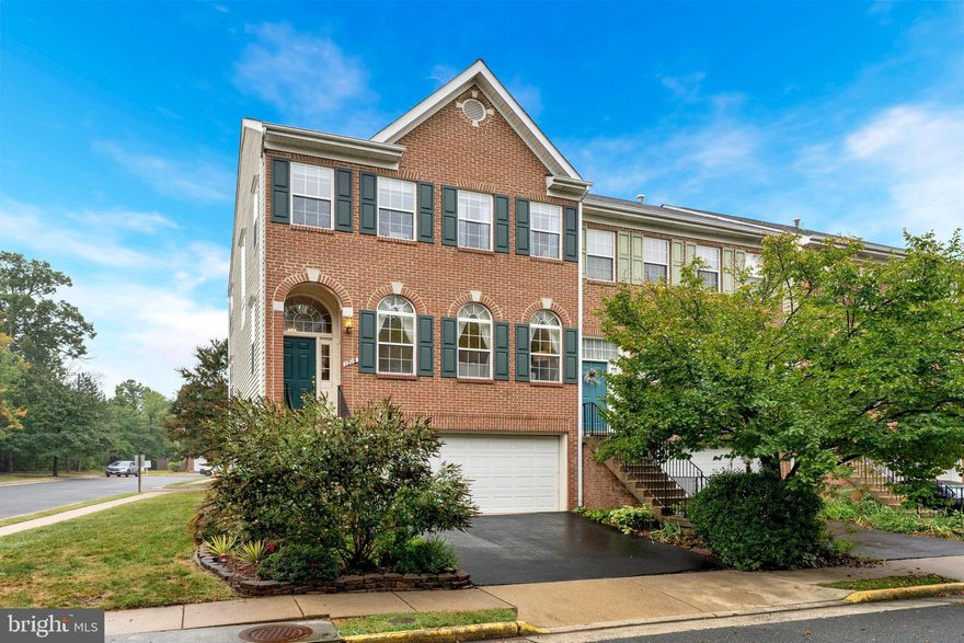 Welcome home to this spectacular end-unit, three-level, townhome that blends modern convenience with abundant natural light and thoughtful design. Just minutes from both Downtown Herndon and Reston Town Center, this home offers unmatched access to easy transportation, shopping, dining, and entertainment.

Stepping inside, oversized windows fill the main level living room with natural light, highlighting the gleaming hardwood floors and expanded ceiling height. The main level is designed for entertaining with a separate dining room space and a recently updated gourmet kitchen (2020) featuring stainless steel appliances, a center island, and direct access to the expansive deck out back. For added convenience, this home features a half bath on the main level, (2024).

Upstairs, you’ll find three spacious bedrooms and two full baths. The primary suite is a true retreat with vaulted ceilings, multiple walk-in closets, and a spa-like bathroom complete with a double vanity, soaking tub, and walk-in shower. Conveniently, the laundry room (2021) is located on the bedroom level.

The additional living space on the lower level opens the door for even more opportunity.  Make it your fitness space, at-home office, or just another entertainment area with easy access to your true 2-car garage! 

Outdoor living is easy with two private spaces: a deck off the kitchen and a fully fenced paver patio. Additional highlights include prime commuter access via Route 7 and the Toll Road. For recreation, the WO&D Trail is just a short walk or bike ride away.  Homes in this development do not come on market often! Don't miss this one!!