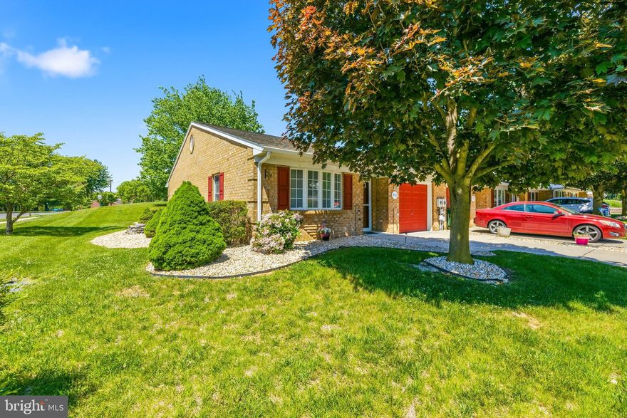 Beautiful well maintained villa in Hagerstown that is centrally located! Near shopping, highways and dining. This end unit brick home provides carefree low maintenance living. Modern  open floor plan! Also includes 2 large bedrooms and 2 bathrooms plus one car garage.  One level living on a quite dead end street and backing to common area. Lawn car and snow removal are included in  low HOA fee ($100 Month). Kitchen appliances are 7 years old, newer laminate floors, carpeting and washer. Home owner is meticulous in maintaining this property, you will not be disappointed! even the garage is carpeted!