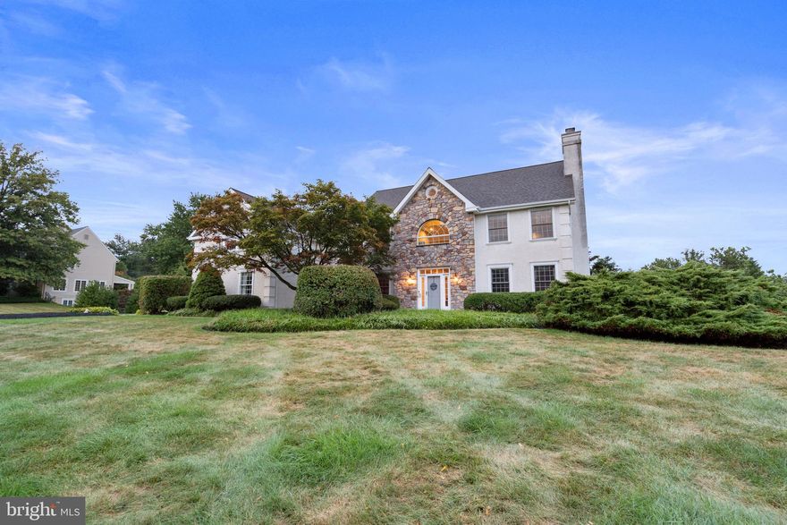 Welcome to this stunning estate, perfectly situated in a sought-after location with serene views of preserved open space. Step inside through the warm, inviting front door to a grand two-story foyer with a graceful turned staircase. To your right, a spacious living room with a cozy gas fireplace awaits, while to your left, a bright dining room sets the stage for memorable gatherings. A convenient butler’s pantry flows seamlessly into the sunlit breakfast room and expansive gourmet kitchen, complete with adjacent laundry / mudroom and access to the three-car garage for everyday ease. The family room is a showstopper with its soaring stone fireplace, built-in entertainment center, and dramatic floor-to-ceiling windows that frame views of the private backyard. A handsome library with custom built-ins provides the perfect retreat or home office. A second staircase from the kitchen leads to the upper landing, filled with natural light from a striking arched window. Upstairs, the luxurious primary suite boasts two large walk-in closets with a spa-like bath. Nearby, a versatile bedroom / sitting room offers flexible use, while a private guest suite with full bath and two additional bedrooms with a hall bath complete the level. The walk-out lower level is designed for both fun and function, featuring a game area with bar, media room, sitting area with gas fireplace, bonus room (or potential 6th bedroom), half bath, and ample storage. The fully fenced yard offers both privacy and a serene retreat, with picturesque views to be enjoyed from the spacious deck or the fabulous inground pool, complete with a sun shelf for the ultimate in relaxation. After a day spent enjoying the spacious backyard, you can return indoors with fresh-picked fruit from your very own peach, apple and cherry trees. This gorgeous, private, and spacious estate awaits. Don’t miss your opportunity to see it in person!