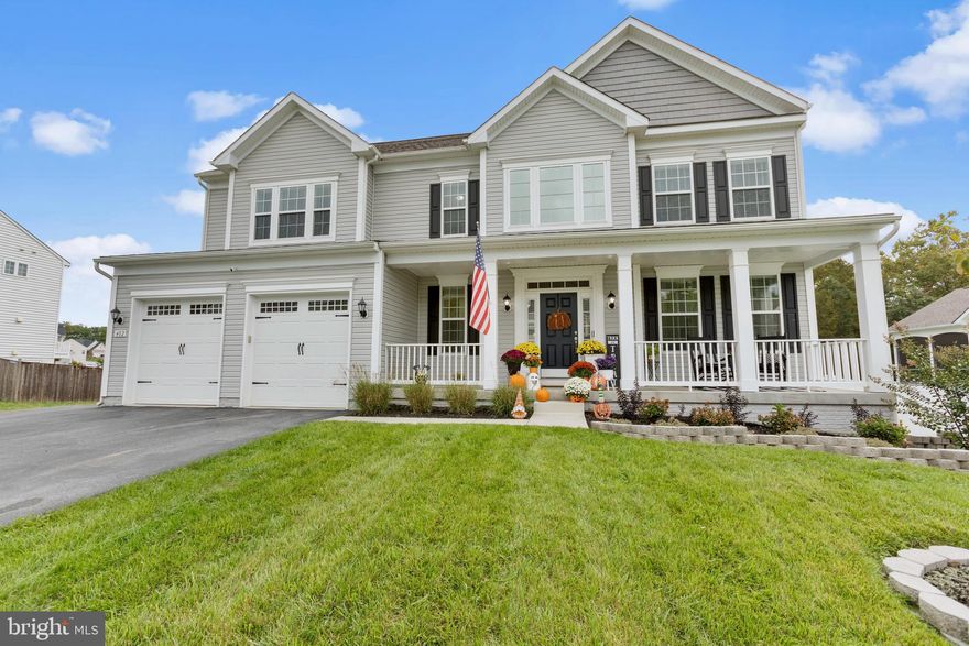 Welcome to this stunning 3-level Colonial home nestled in a peaceful neighborhood, offering an array of amenities and modern comforts for luxurious living. With its charming vinyl siding exterior, front porch, 2-car front-load garage, and a meticulously paved driveway, this property exudes curb appeal from the moment you arrive.

As you step inside, you'll be greeted by an elegant and thoughtfully designed interior. The main level features exquisite engineered hardwood flooring that flows seamlessly throughout. The heart of the home is the gourmet kitchen, a culinary enthusiast's dream, boasting quartz countertops, a spacious island, a convenient breakfast bar, a well-appointed pantry, and top-of-the-line stainless steel appliances, including a gas cooktop, double wall oven, and built-in microwave.

Adjacent to the kitchen is the dining room, where you'll find a cathedral ceiling that adds a touch of grandeur to your dining experience. The family room, thoughtfully situated off the kitchen, provides a cozy space for relaxation and entertainment. Additionally, a private home office offers a quiet retreat for work or study, while a half bath and a convenient mudroom complete the main level.

Upstairs, the upper level hosts four generously sized bedrooms and two baths, including the luxurious primary owner suite. This retreat features a sitting room, a spacious walk-in closet, and an attached luxury bath with a soaking tub and a stall shower with a comfortable bench seat. Three additional junior bedrooms share a full bath, and the convenience of a laundry room on this level makes daily chores a breeze.

The lower level of this home offers a versatile space for entertainment and relaxation. The spacious recreation room features a custom-built bar, perfect for hosting gatherings and creating lasting memories. A fifth bedroom and a full bath provide flexibility for guests and ample storage options are available throughout the basement.

Step outside to the rear of the property and discover a vinyl privacy-fenced yard with a storage shed, creating a secure and picturesque space for outdoor activities and storage needs. The maintenance-free deck is perfect for enjoying the serene wooded backdrop, offering a peaceful oasis for morning coffee or evening gatherings.

In summary, this Colonial home offers an exceptional blend of modern luxury and functional design. From the gourmet kitchen to the spacious bedrooms, and the beautifully landscaped outdoor space, every detail has been carefully considered. Don't miss the opportunity to make this property your dream home – schedule a viewing today and experience the beauty and comfort it has to offer!