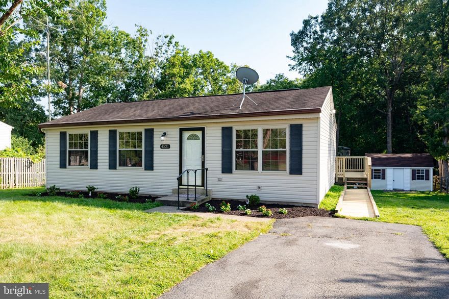 OPEN HOUSE CANCELLED. Bright 3 bedroom 1 bath single family home for condo price! Large ¼ acre lot.  Vaulted ceiling in living room.  Hardwood floors throughout. Outdoor storage closet.   Free standing shed with electricity, dedicated heat pump and hardwood floors.  Large deck with brand new flooring and new handrails installed.    HVAC 2022.  No HOA.  Memberships to neighborhood pool are available.  Trails from the neighborhood run through County parkland.