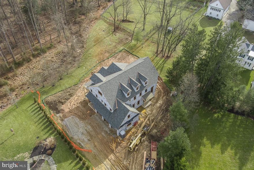 A brand new custom home by CD Hall Builders is under construction in an unmatched setting in the prestigious Saybrook community.  Set perfectly in a natural setting, you are minutes to all the Main Line's shopping, dining and attractions, the Route 30 corridor and the new Paoli Transportation Center, offering easy access to Philadelphia and New York. Within the top rated Tredyffrin Easttown School District. Designed by McIntryre Capron Associates, this home is well executed with perfectly proportioned rooms, flawlessly merging classic architecture with contemporary design. The stone and fiber cement siding exterior is designed to fit in to the existing neighborhood, and offers refined finishes and detail. .A solid wood front door welcomes you to a gracious Foyer accented by a stair tower. Well proportioned rooms are highlighted with detailed millwork and ten foot ceilings, and offer imaginatively planned spaces catering to both family and guests. The gourmet Kitchen includes stainless steel appliances and Quartz countertops, a Butler's Pantry with wine cooler and a unique walk in pantry/back kitchen which includes cabinetry and a second sink. The sunny Morning Room opens to a spacious covered porch, perfect for outdoor dining and entertaining. Also adjacent is the Great Room, with a wood burning fireplace. The Formal Dining Room includes wainscoting . Off the Foyer is a private Study, and a full bath room tucked behind the Stairs. The first floor is finished with a 3 car garage, a Mud Room including a powder room, outside entrance, and work station tucked behind barn doors. A sophisticated Master Suite features a tray ceiling, two walk-in closets and an elegant main bath with current finishes and styling, featuring an oversized shower with a built in seat and transom window, a free standing tub and separate vanities . Four spacious secondary bedroom's (one with an adjacent bonus room) , 3 full baths and a laundry room complete the second floor. A finished daylight lower level with a full bath expands the living space. Two separate high efficiency HVAC systems with multiple zones, site finished hardwood throughout the first floor and second floor hallway, Pella windows, Kohler plumbing fixtures are just some a quality features throughout. This combination of location, lot size and craftsmanship is a rare opportunity.   Final taxes to be determined.