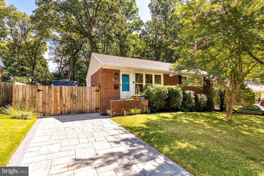 Offers due byTuesday, 8/22, at noon. Seller requests Monarch Title. Community, Condition and Convenience come together in this renovated 4-BR (could be 5BR), 2 Bath Rambler on 2 finished levels with nice space inside and out. The main level offers an open Living Room and Dining Area combo plus spacious, updated Kitchen with good counter/cabinet space, eat-in peninsula  and an area fora high-top, bistro-style table or additional storage. Past the living room with its large picture window leads you to 3 Bedrooms and a full Bathroom. The lower level is accessed from the kitchen and/or side exterior entrance. It has been completely renovated and finished into a versatile space than includes Family/Rec Room, Kitchenette/Wet Bar, 2nd full  Bathroom, 4th Bedroom,  Den (or 5th Bedroom), Laundry + Utility Room. There is a side entrance off the stairwell that is accessible both from the main and lower levels. The house was completely renovated in 2012 and has only been improved since then.  Recent updates include new stamped, concrete, stone-style driveway, kitchen and basement tile floors, full house paint, installation of french drain & pump, landscaping, fencing, kitchenette in basement, new roof in 2015 and HVAC in 2016. You will feel like a veritable land owner when you step outside to enjoy this oversized lot. In addition to the nice yard and large driveway out front, the driveway continues past the house to the flat, fenced-in, deep & wide back yard where you will also find a wonderful patio, ample green space, garden beds, fire pit, storage shed (with electricity) and wonderful wooded/tree views . The house sits on a quiet street and offers easy access/proximity to the  BW Parkway, 495 , Annapolis Road/450 and Route 50. It is conveniently located and minutes to the retail, restaurants, parks and more of Greenbelt, Hyattsville Arts District, UMD and DC.