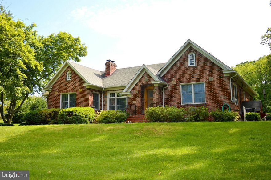 CUSTOM BUILT home in heart of Historic Relay. Min 2 Patapsco State Park & MarcTrain. Oversized rooms w/WIC. 2FP, HW Floors, Sunroom, 2Car Garage, Paver Patio & Firepit, Flagstn Walkway, Crown Mold, Circ Driveway, NEW Corian Counters, Master Suite w/cedar WIC closet. New Slate Appl & HW Dispenser.  Lots of Attic Space for storage. Playground Equip and Mini Golf.  This one has it all!