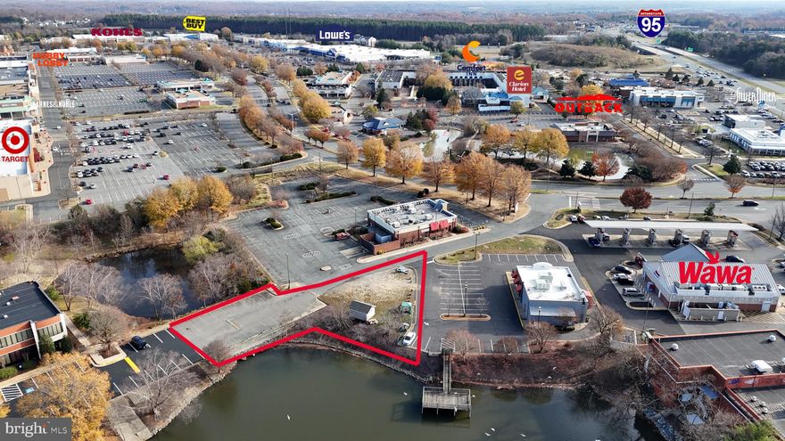 Exceptional Commercial Development Opportunity in Central Park Shopping Center, Fredericksburg, VA

Explore this rare investment opportunity in Fredericksburg's premier retail destination, the Central Park Shopping Center. Offering a .45 acre lot approved for a three-story building with a total of 6,807 sq ft of space, this site is perfect for a combination of retail and office use. The first floor provides 2,169 sq ft of retail space, while the second and third floors offer 2,319 sq ft each for office spaces, ideally positioned to serve a diverse range of business operations.

Located near popular high-traffic stores and adjacent to recognized names like WAWA and Target, this property backs onto a scenic lake, providing a tranquil view and a distinguished setting for any business. Central Park Shopping Center attracts millions of visitors annually and hosts a dynamic array of retail options, making it a magnet for consumer and business activity.

Strategically situated near I-95, the site benefits from exceptional visibility and accessibility, ensuring steady customer footfall from Northern Virginia, Richmond, and beyond. The potential for significant commercial success is bolstered by the center's robust mix of retailers and eateries, catering to a wide demographic.

This is an unparalleled opportunity for developers and investors to embed their business in the heart of a thriving retail hub. Act quickly to secure this prime location and transform it into a cornerstone of commerce and service.

Contact us today to learn more about this prime property and start your success story at Central Park Shopping Center.