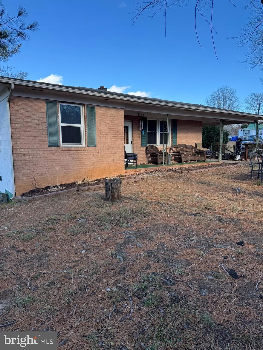 Opportunity Awaits on This 5-Acre Agricultural Property.
5-acre farmlet with a natural spring that flows from the Hazel River , currently used for cattle. The property is fully fenced behind the home and offers strong potential for farming, livestock, or future improvements. The brick-front, single-level rambler features 3 bedrooms and 1 full bath and is livable but in need of renovation. The home includes washer and dryer hookups, gas heating, option for a gas cooking stove, and a fireplace (sold as -is). Major system updates include a newer HVAC system, professionally sealed crawl space, and a generator. Additional property features include, three outdoor storage sheds, fully fenced pasture area, owner-owned propane tank. Agricultural zoning; taxes paid. Fireplace is being sold as-is and presents a great opportunity for buyers looking to renovate while enjoying usable land and agricultural benefits.