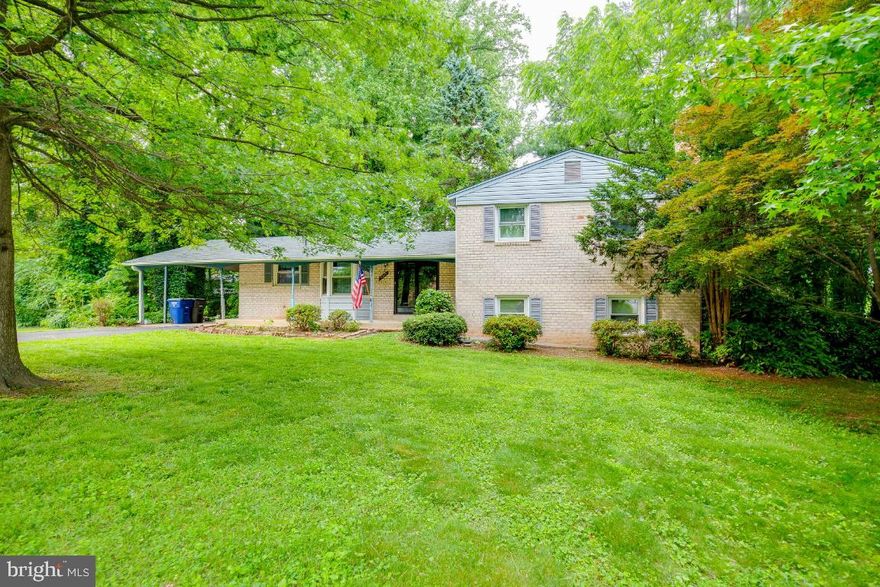 **Handyman Special**  Outstanding opportunity to live in West Springfield on a corner lot! Walk to Orange Hunt Elementary! Fantastic floor plan including 4 levels, 4 bedrooms/2.5 bathrooms, hardwood floors, a large front porch, backyard deck, a cozy family room with wood burning fireplace, a separate laundry room with sink and a carport. Roof, gutters and siding replaced just 3 years ago.   Feeds to Orange Hunt, Irving and West Springfield schools.  Just 10 minutes to 395/495/95, Springfield Town Center shops/restaurants and Franconia Metro. Just minutes to FF Co Parkway.  Home is being sold AS IS. Renovation needed. Quick closing preferred.  Book your appointment today!