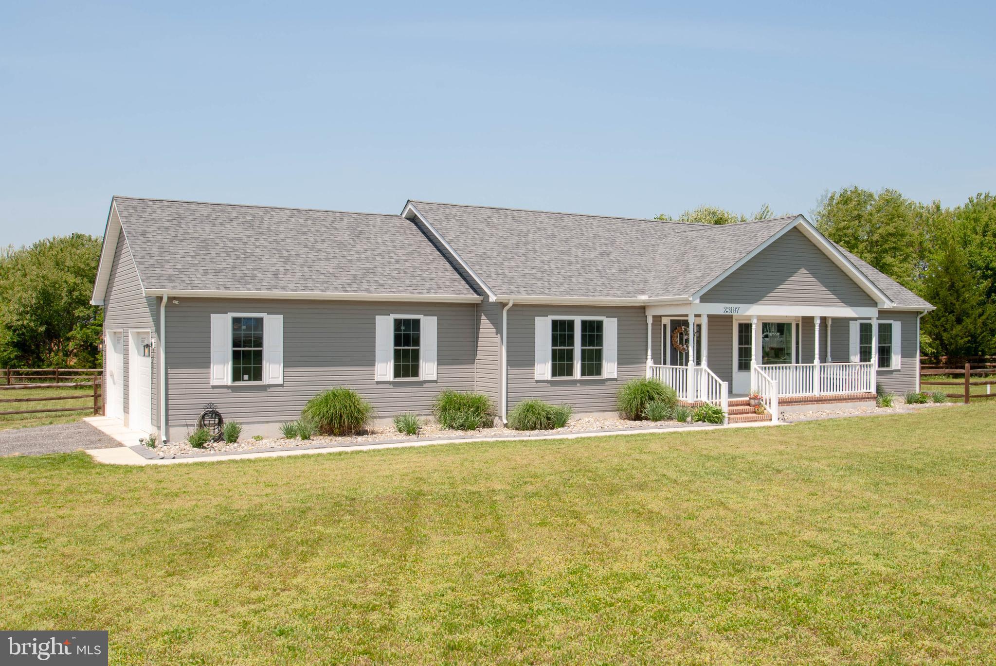 Better than new, this 2.5 year young home is on a premium lot that offers privacy and plenty of space on over 1.4 acres. Lovely hardscaping with a fire pit, landscaping and backing to woods. The patio faces westward for incredible sunsets. Pictures cannot do this adorable home justice!