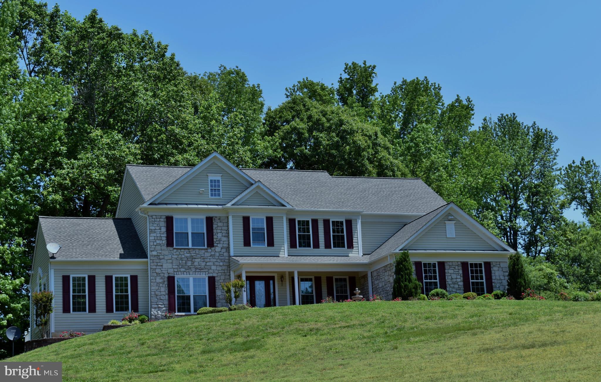 Look no more, 20 + Acres, open yard or pasture, new paint, carpet, Garage finished, Pools open, deck on rear with access to the sun room, and Breakfast room, There's a place for mom in the basement with a kitchen, full bath, and walk-in closet but lock up the 700 bottle wine cellar before she arrives, everywhere you look there is an up grade, private, lot schools 3 miles away, 20 min to Annapolis