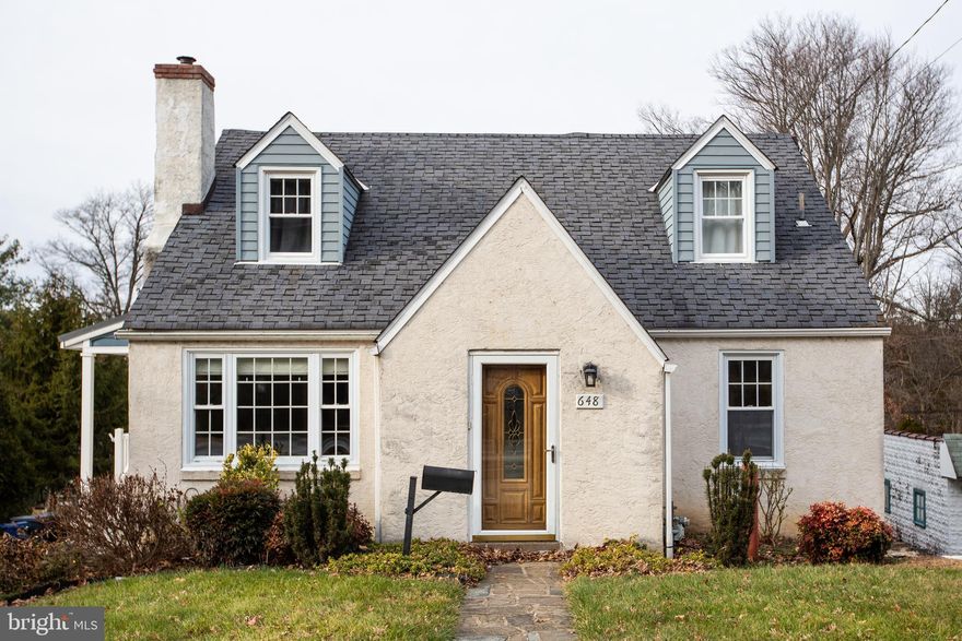 Motivated Seller! Charming 3 Bedroom, 3 Full Bath Cape Cod on a Double Lot in Glenside.

Welcome to this lovingly maintained Cape Cod home, offering 40 years of pride of ownership and an incredible blend of character, comfort, and modern upgrades. Situated on a spacious double lot with established gardens and mature landscaping, this 3-bedroom, 3-full-bath home provides exceptional indoor and outdoor living space.

Main Level Highlights

Updated full bath (2020) with walk-in shower and sliding glass doors, conveniently located on the first floor.
Inviting living room featuring an electric fireplace and mantle (2020) and a newer beautifulChicago window that fills the space with natural light. Freshly painted. 
First-floor bedroom ideal for guests or one-level living.
Renovated kitchen (2019) with KitchenAid appliances, quartz countertops, farmhouse sink, pot filler, built-in convection microwave, and exceptional storage— including a dedicated stand-mixer cabinet and organizational drawers throughout. Two windows overlook the deck and big backyard.
Formal dining room off the kitchen, perfect for entertaining.
Direct access from the kitchen to the elevated, refinished deck with gate, half of which is covered and features shades and a ceiling fan for year-round enjoyment.
Stunning 1990 Addition
A spacious bonus living area featuring:

Wood-burning fireplace
Built-in shelving
Walk in closet
Sliding glass doors leading to the deck
Second Floor Features

Two nicely sized bedrooms, including:
One with a walk-in closet and a charming built-in window seat with storage
One with a loft area and skylight, perfect for an office or reading nook, overlooking the living room addition and fireplace
Full bathroom with double sinks
Modern Comfort & Utility

Brand-new HVAC and water heater (2023)
Hardwood and tile flooring throughout the first level
Full walkout basement, offering:
Laundry room with utility sink, hook ups for washer/gas dryer, shower stall, toilet, and bathroom sink
Second utility sink with concrete countertops and prep area
Large workshop area with a wood burning stove and double doors opening to the driveway. A handyman’s dream. 
Double wide driveway wraps behind the home, plus street parking available
Sidewalk community; close to regional rail, shopping, and downtown Glenside
Outdoor Space
Enjoy a large backyard with mature flower beds, established gardens, garden sheds, and plenty of storage options both inside and out.