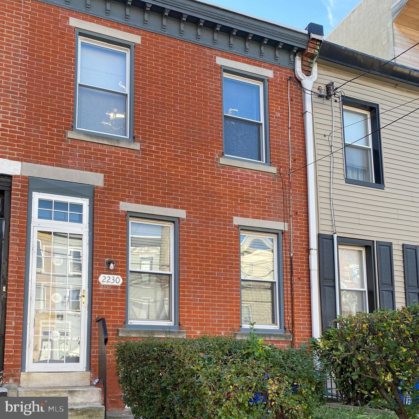 Welcome to 2230 Bainbridge Street, an original three-bedroom, two-bath home located in the highly desirable Fitler Square neighborhood. This rare city property features a large front lawn, a private rear yard, and excellent walkability to parks, dining, shopping, and local amenities.
The home offers a traditional layout with three spacious bedrooms, two full bathrooms, and a full basement ideal for storage or future finishing. Thoughtfully maintained with great bones, this property presents a fantastic opportunity for customization or renovation. Affordable As Is or as an investor.
Zoning may allow for the addition of a third floor and rooftop deck (buyer to verify with the city)—creating even more living space and the potential for panoramic views of Center City and significant increase to values ranging to $1.5 million with such improvements. Several homes on the block have already built a third floor and roof top deck.
Enjoy tree-lined streets, access to the Schuylkill River Trail, Fitler Square Park, and easy commuting via University City, Rittenhouse Square, and major highways.
Don’t miss the chance to own and/or expand on a home in one of Philadelphia’s most beloved neighborhoods.
