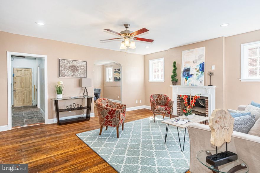 INVITING SEMI-DETACHED ROWHOME WITH 3 FINISHED LEVELS & DETACHED GARAGE!  Features include a spacious living room and separate dining room with hardwood floors, Chef's kitchen with ss appliances & tile backsplash, main level half bath, upper level Primary bedroom with full bath, and 2 additional bedrooms with a hall bath, finished lower level with a family room, full bath, and laundry area, and a rear fenced yard which leads to a detached 1 car garage!