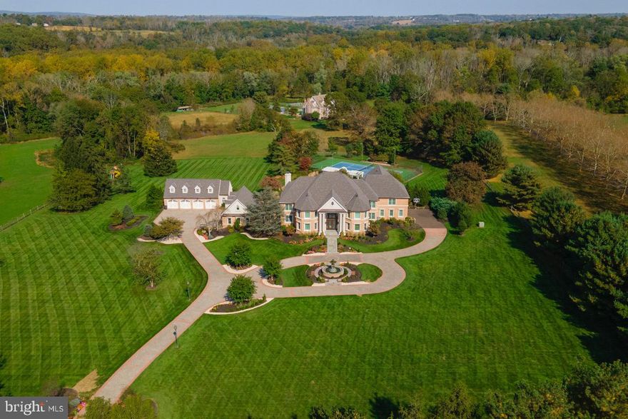 Welcome to the magnificent Ivy Manor, an exclusive, one of a kind estate sitting on over 5 acres of flat land surrounded by beautiful views of the grounds.  Behind a gated entry, the exquisite landscaping and hardscaping is designed to perfection by Gasper. This home was completely gutted and renovated by one of the most prestigious custom builders in Bucks County, Zavetta Custom Homes. The sellers spared no expense when designing this home, with over $5million dollars in renovations in 2018, which is why it has been featured in numerous builder and landscaping magazines. This serene estate features 11,000+ sq. ft. in the main home with a spacious 1500 sq. ft.  guest house above a detached garage. This home features 6 bedrooms, 8 full baths, 2 half baths, 6 fireplaces, and a 7 car garage. It also has a beautiful heated indoor pool & jacuzzi, large sauna, steam shower, spa, movie theater, gym, and a 260 gallon saltwater aquarium! This home is fully equipped with smart home automation with Lutron Lighting, distributed video, cameras, and Sonos sound systems through out the entire house and backyard. You will also enjoy the high end appliances, heated floors, a butler pantry, and a custom wine closet with a cooling system. But that’s not all, the yard has its very own Koi Pond overlooking a tennis court as well as lavish fountains in the front and back of property. This home went through a full gut renovation in 2018 with a brand new roof, new stucco all around, new pool equipment, new geothermal heating and cooling system, new appliances, and much much more!  This luxurious estate is being sold FULLY FURNISED.  The buyers won’t need to worry about hiring a designer since there is over $500,000 in beautiful custom high end furniture and window treatments already designed to perfection! This gorgeous property is centrally located to commute to Center City Philadelphia, New Jersey and New York.  Just a few minutes drive to 95 and a few minutes to the train station!