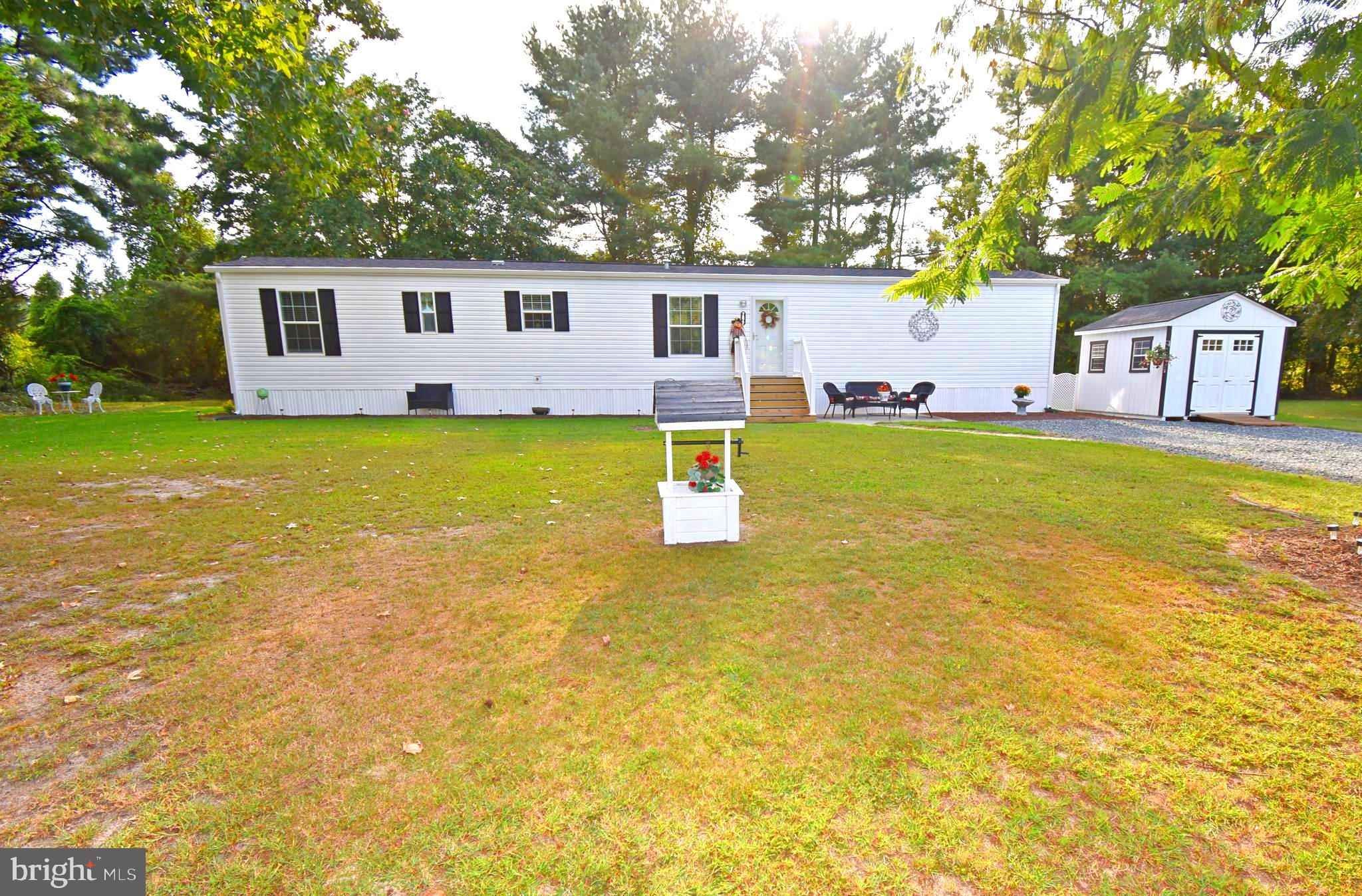 ***Open House Sun, Jul 20 2:00 PM - 4:00 PM*** Welcome to 7877 Bennett Park Dr, a delightful 3-bedroom, 2-bathroom home offering comfortable living in approximately 980 sq. ft. Perfect for first-time buyers or those looking to downsize, this home has been thoughtfully maintained. Key features include an open concept living, dining and kitchen area with stainless-steel appliances. A spacious extended driveway, providing ample parking for multiple vehicles. A 10x12 shed for extra storage or a potential workshop. New gutters and gutter guards, ensuring low-maintenance exterior care. A newer storm door for added security and energy efficiency. Washer and dryer included, making this home truly move-in ready. This home combines functionality with convenience, set in a quiet neighborhood, and ready for you to call home. Ground Rent Includes: Water, Sewer, Trash, Taxes and snow removal on main roads. Don't miss your chance to see this gem. Schedule your showing today!