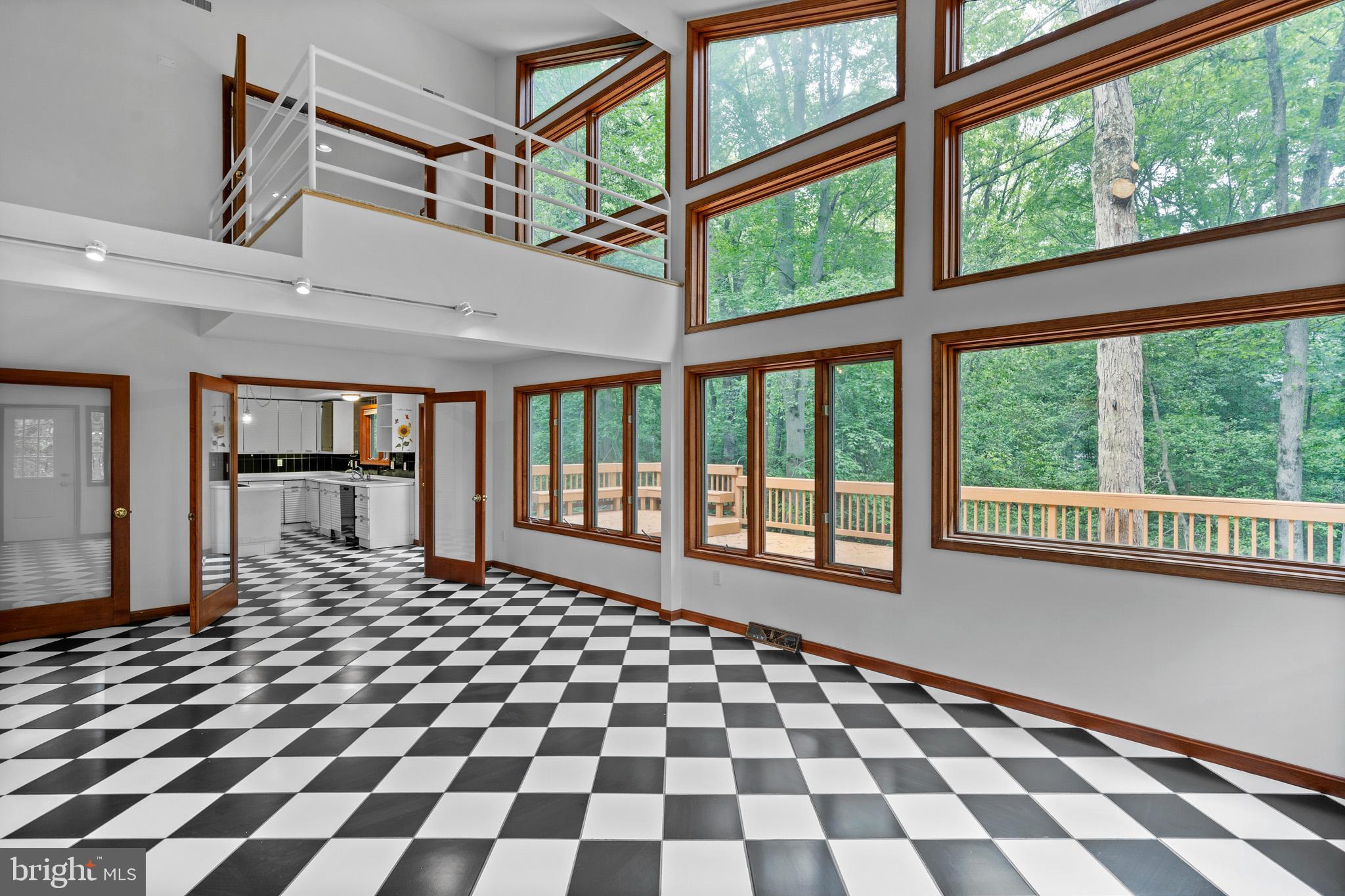 Don't miss your chance to explore this hidden gem in La Plata—your perfect retreat might be waiting!
Step into this truly unique property tucked away on a beautifully wooded lot offering peace, privacy, and a touch of nature all around. With walls of windows throughout, this home is bathed in natural light and offers stunning views of the surrounding trees from every room. Whether you're sipping coffee while watching wildlife or entertaining in the open living space, this home provides a serene escape with unmatched character.
Discover the charm of this unique contemporary home, nestled on 2.5 acres of peaceful, wooded land in La Plata. With over 3,500 sq. ft. of living space, this cedar-sided retreat features a wood-burning brick fireplace, a two-car attached garage, and a paved driveway with ample parking. Freshly painted throughout as well as new carpet, and professionally cleaned.
Step outside to a spacious partial wrap deck (freshly painted), perfect for entertaining or unwinding in nature’s tranquility. Explore your private walking trails, complete with a stream, and experience the beauty of the natural surroundings. Inside, the sunroom offers panoramic views, bringing the outdoors in for year-round enjoyment.
This home also features a versatile additional space with a private bath and separate entrance—ideal for use as maid’s quarters, a workshop, extra storage, or whatever suits your needs. The possibilities are endless!
This home is a rare blend of serenity and modern living—are you ready to make it yours?