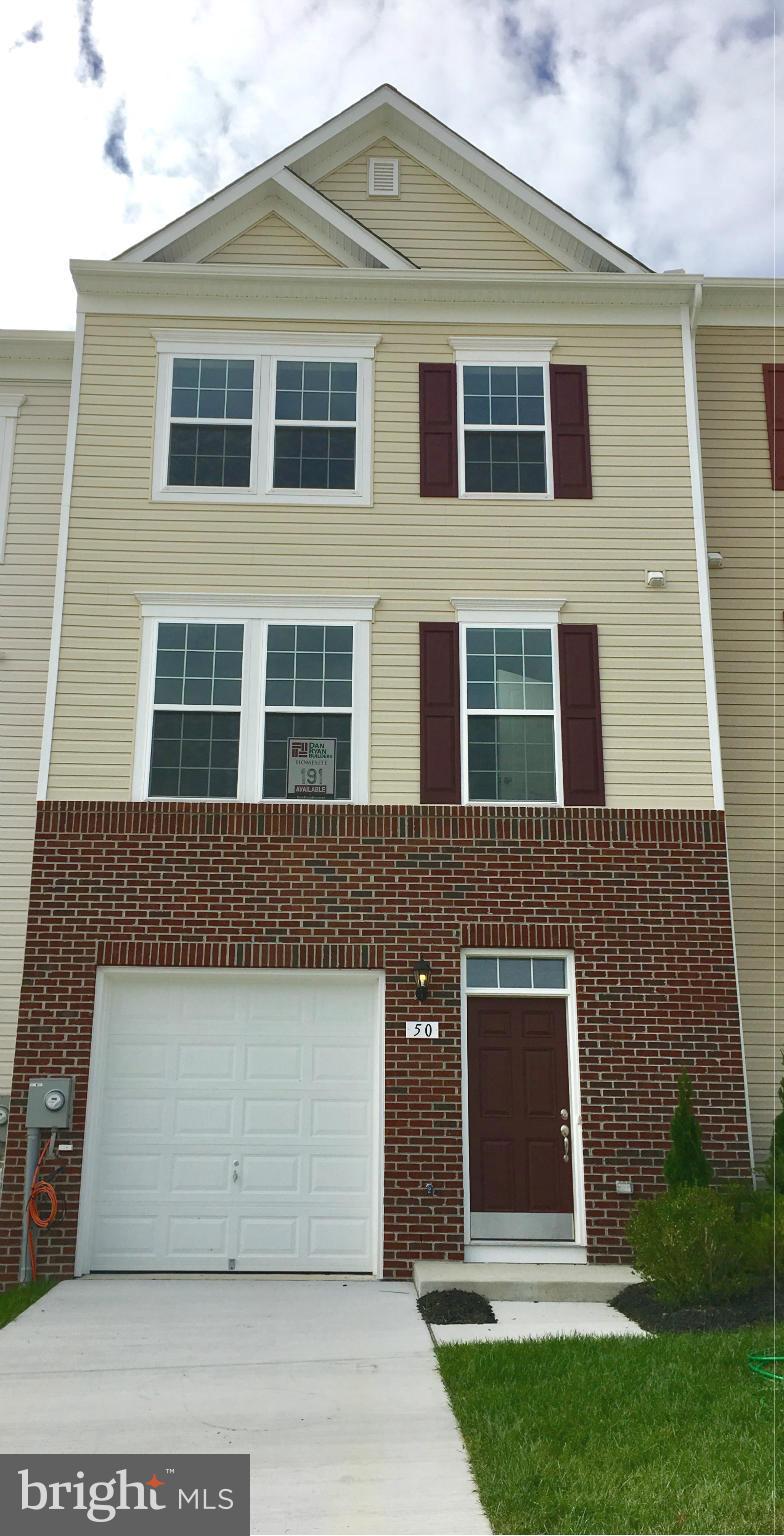 IMMEDIATE DELIVERY! Free Finished Rec Room! Closing Cost Cash! 100% Financing Available! Dan Ryan Builders Riverside Villages Yorktown II 3 level townhome! Available now! 8' Morning expanded plan, open island kitchen/dining, appliances, Sweet owner's suite, 2-rec room finished lower level, handsome brick 1/3 front, 1 car garage. Close to MD line, lots of style & energy efficient 2x6 walls!