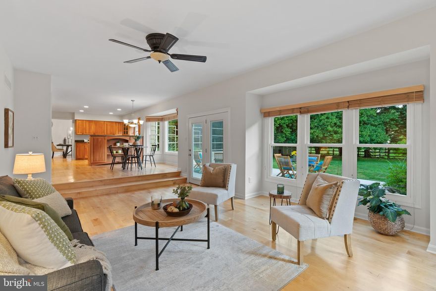 Stunning Colonial with 4 bedrooms up and unbelievable Master Suite that features steam aromatic shower, huge walk-in shower, his and her walk-in closets and a laundry/exercise area that goes on and on as it's own retreat.  Perched across the street from the Chesapeake Bay this home also offers Community Beach and a spot to stow your kayak or board.  No cross traffic in this quiet neighborhood and desirable Broadneck schools.  Main level office.  Stunning remodeled kitchen and five burner Bosch stove with Cherry cabinets and blue onyx granite.  Thermal windows replaced in 2016 come with lifetime warranty.  Maple floors freshly refinished and drywall pointed up and entire house freshly painted with cool colors.  Flowing, gracious floorplan is an entertainers dream.  Finished basement with game area, exercise area, storage, bar and full bath. Basement has sump pump with battery back-up and wired for whole house generator in case of power outages.  Level backyard.  A thoughtful, classy house that offers high end living.  Raised bed planters and fenced garden extravaganza safe from deer and cut your herbs for dinner.   Multiple  offers expected so seller requests best and final contracts to Mary Ann by Thursday  the 3rd at noon!