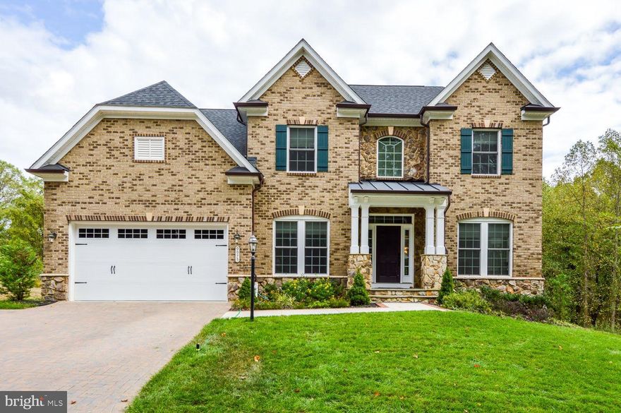 Absolutely stunning and immaculate colonial Luxury single family home built by NVHomes, located in the beautiful and sought-after Howard County community of Wincopia Farms, this home is a Must See!! Modern open floor plan, gleaming hardwood floors, stunning pillars, walls of windows, tons of natural light, granite counters, upgraded cabinets, stainless steel appliances, crown molding, chair rail, high-end light fixtures, tray, and cathedral ceilings. This home's first floor offers a dedicated home office for wonderful work-from-home options. On the second floor you will find three generous bedrooms, each with direct bathroom access in addition to a huge primary bedroom with walk-in closet, not to mention the primary bathroom’s elegantly styled with separate vanity’s, soaking tub, and a large walk-in roman shower. A separate easy to access laundry room with sink completes the second floor. This gorgeous home boasts a large, fully finished walk-out basement with a fifth bedroom and bathroom. For your entertainment, the basement is completed with a full wet bar with upgraded cabinetry and a stainless-steel dishwasher and offers much more space to accommodate your present and future entertainment needs. The two-car garage comes with a custom installed storage cabinets and expanded driveway to accommodate the third car.