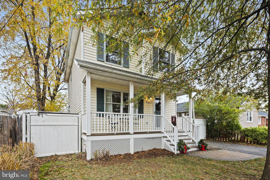 FIRST SHOWING @ OPEN HOUSE, SUNDAY, FEBRUARY 8TH 1:00 - 4:00. Front Porch Two-Story Home in popular Woodland Beach! Built in 2000, this 3 Bedroom, 2.5 Bath Home is located just blocks from access to Woodland Beach amenities and Glebe Bay/South River. Spacious Open Living Room w/Country Kitchen boasting Stainless Appliances, Granite & Butcher Block Counters. Charming Sunroom off the Kitchen Laminate Plank Flooring thru-out Main Level. Upper Level boasts 3 Bedrooms including a Primary Suite. Fully fenced Backyard with Storage Shed. Driveway parking for 2 vehicles. See me today, before the Football Festivities begin!