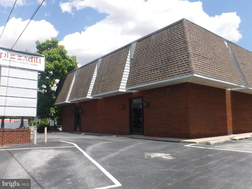 PRICE REDUCED !!!!Pizzadili  Plaza  is located on Rt 13 just south of Dover and Rodney Village. Great potential at this location  some leases upstairs in place with a shared conference room  on first floor for all Tenants use. Downstairs is equipped with a full operating kitchen facility .There are  twelve office spaces upstairs which seven are currently  rented  with  year  leases in place. In addition there are six more office spaces upstair that are available for immediate occupancy .  Bathrooms are  located upstairs and down stairs.  The   parking lot is shared with cross  access and maintenance easement in place with property owners  next door. Great location with many possibilities, just across for the puncheon  run connector and Rodney Village shopping center. Don't miss this great opportunity to be right on Rt 13.