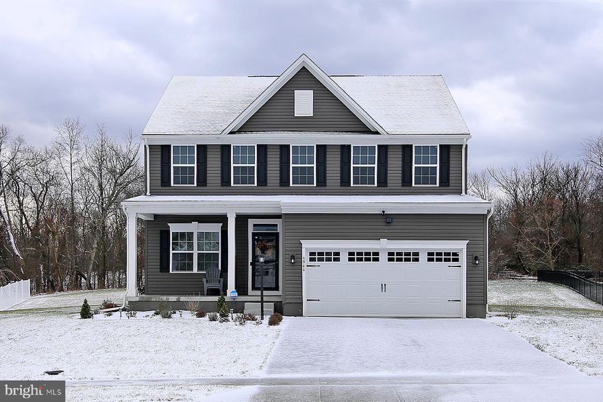 This beautiful home is not only in a great location but is only a year and a half old. Features include 4 bedrooms, 3 full baths and one half bath, 2 car garage,  natural gas and tankless hot water heater,  the popular open concept design and .66 acre lot with woods as your backyard neighbor.1, 2025 but you can Living room TV , Ring security system inside and out, are included. Two winterberry bushes are excluded from sale.  Immediate neighborhood features walking trails, pavilion and playground.