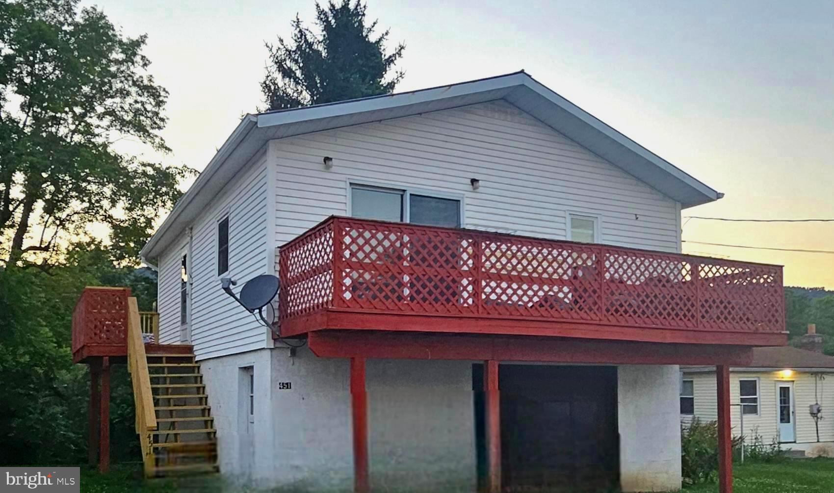 Great for 1st time home buyers or Investors 2 bedroom dwelling (ADU) over garage, large 12x15 kitchen, living rm, 2 bedrooms and full bath. all new windows recently put in,12x15 sqft living room with sliding doors leading to 7x24 balcony deck, new 2 tier deck with steps minutes to town conveniences, attached oversized garage with washer & dryer, toilet & sink, double liner stainless steel flue for wood, pellet, or gas stove 200 amps, over 700 sq ft in garage (separately metered) from living quarters, 24 hr notice to show. TENANT OCCUPIED RENTING FOR $850 MONTHLY
Seller is offering adjoining property MLS # WVHS2006254 for a combined purchase and 5k in closing cost only when buying both properties together at no less than 385k