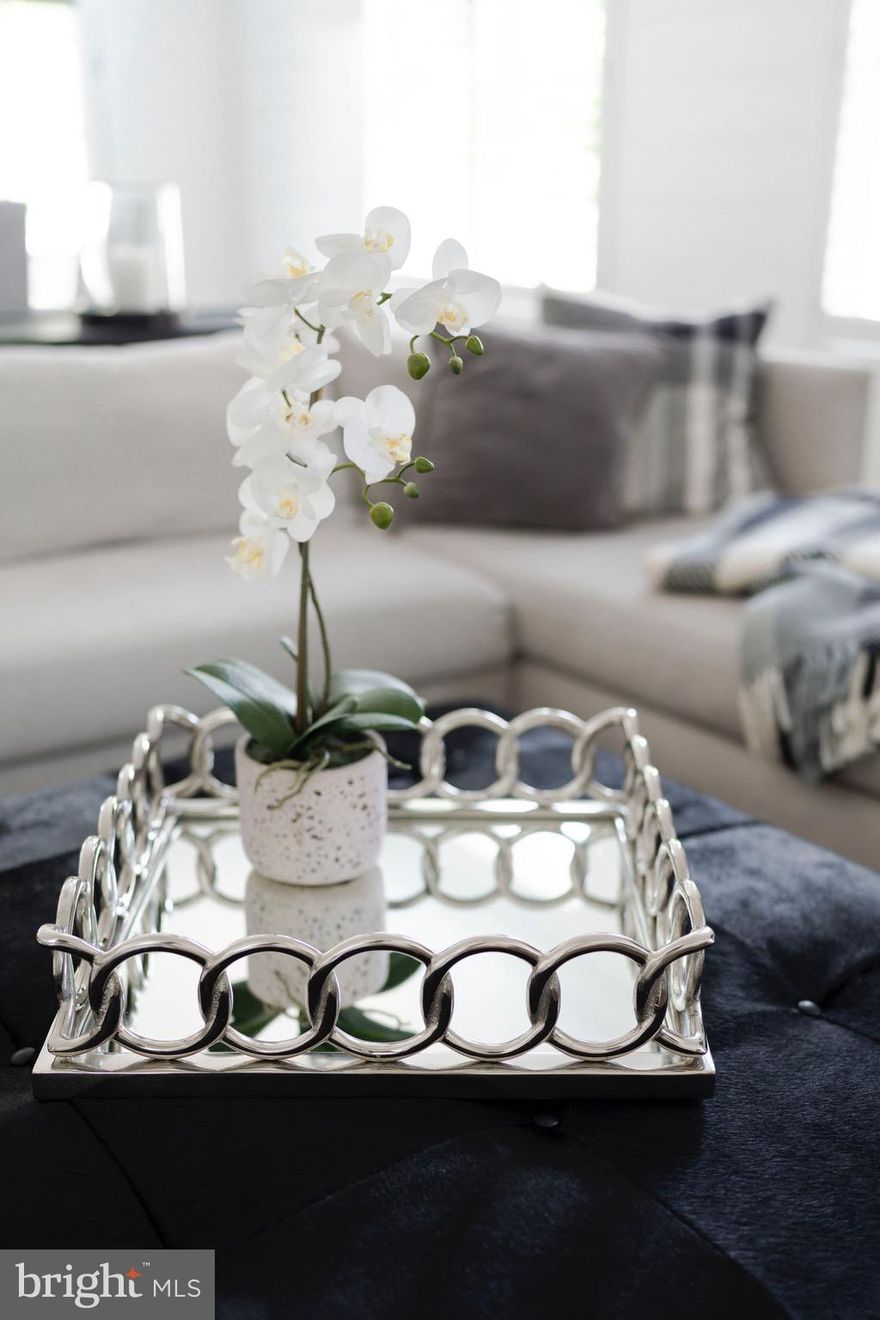 Welcome to Rabbit Run Creek, an exquisite enclave situated in the charming River Town of New Hope, Pennsylvania. As the sole gated community in this idyllic town, Rabbit Run Creek offers a truly exceptional living experience, where privacy and security take center stage. Nestled in a picturesque setting surrounded by lush greenery, this community is a haven of tranquility. The homes at Rabbit Run Creek have been meticulously designed to provide the epitome of luxury and comfort. Every detail has been carefully considered, from the spacious living areas to the high-end finishes and top-of-the-line appliances. The upgrades in this unit are too numerous to list, elevating it to a level of unparalleled distinction. As you step inside, you'll be captivated by the open concept floor plan, which is both inviting and functional. The kitchen is a culinary masterpiece, featuring a huge island, a Wolf 5-burner commercial range with a full-size oven, a Wolf Wall Oven, a Wolf Built-in Microwave, a Subzero side-by-side refrigerator, a commercial-grade hood, a Bosch dishwasher, and stunning honed marble countertops and island. The butler's pantry nestled discreetly between the dining room and kitchen area, the butler's pantry is a hidden gem designed to enhance your entertaining experience. With its stunning aesthetics matching the beauty of the kitchen, this space offers both functionality and elegance. It provides a seamless transition for serving and staging, ensuring that the flow of your gatherings remains uninterrupted while adding a touch of sophistication to your entertaining endeavors..  The great room is adorned with a gas fireplace and a custom poured cement mantle, creating a cozy and sophisticated ambiance. A separate living room with a coffered ceiling sits adjacent to the formal entrance, along with a convenient home office. Upstairs, you'll discover the immense Main Suite, complete with an incredible ensuite bathroom, a large soaking tub, and an incredibly spacious walk-in shower. The main suite's walk-in closet, featuring an island, is the perfect finishing touch. Additionally, there are two other en-suite bedrooms, with the potential for a third bedroom on the upper level, as well as a laundry room for added convenience.  Descend to the lower level of this remarkable home, where luxury and entertainment seamlessly come together. Here, you'll discover a full bathroom and a spacious bedroom, providing comfortable accommodations for guests or family members. The bar area is a true centerpiece, featuring ample bar chairs that invite socializing and relaxation. Complete with an ice maker, refrigerator drawers, and a dishwasher, this bar is fully equipped for hosting memorable gatherings. However, the true highlight of the lower level is the awe-inspiring all-glass walk-in wine cellar. Showcasing your most prized vintages in a stunning display, this wine cellar is sure to impress even the most discerning connoisseurs. Whether you're enjoying a quiet evening with friends or hosting a lively celebration, the lower level of this home offers an unrivaled space for entertainment and indulgence.  Last but not least, step outside onto the enlarged blue stone patio, a captivating outdoor oasis that invites you to unwind and savor the beauty of your surroundings. Enclosed by stone walls, this meticulously crafted space exudes a sense of privacy and tranquility. The centerpiece of this outdoor haven is the built-in Wolf grill, accompanied by a fully equipped outdoor kitchen. Whether you're hosting a casual barbecue or a gourmet feast, this outdoor culinary haven offers everything you need to create culinary masterpieces amidst the fresh air. With the enchanting combination of natural stone, built-in amenities, and ample space for lounging and dining, this patio is the perfect setting for memorable gatherings and cherished moments