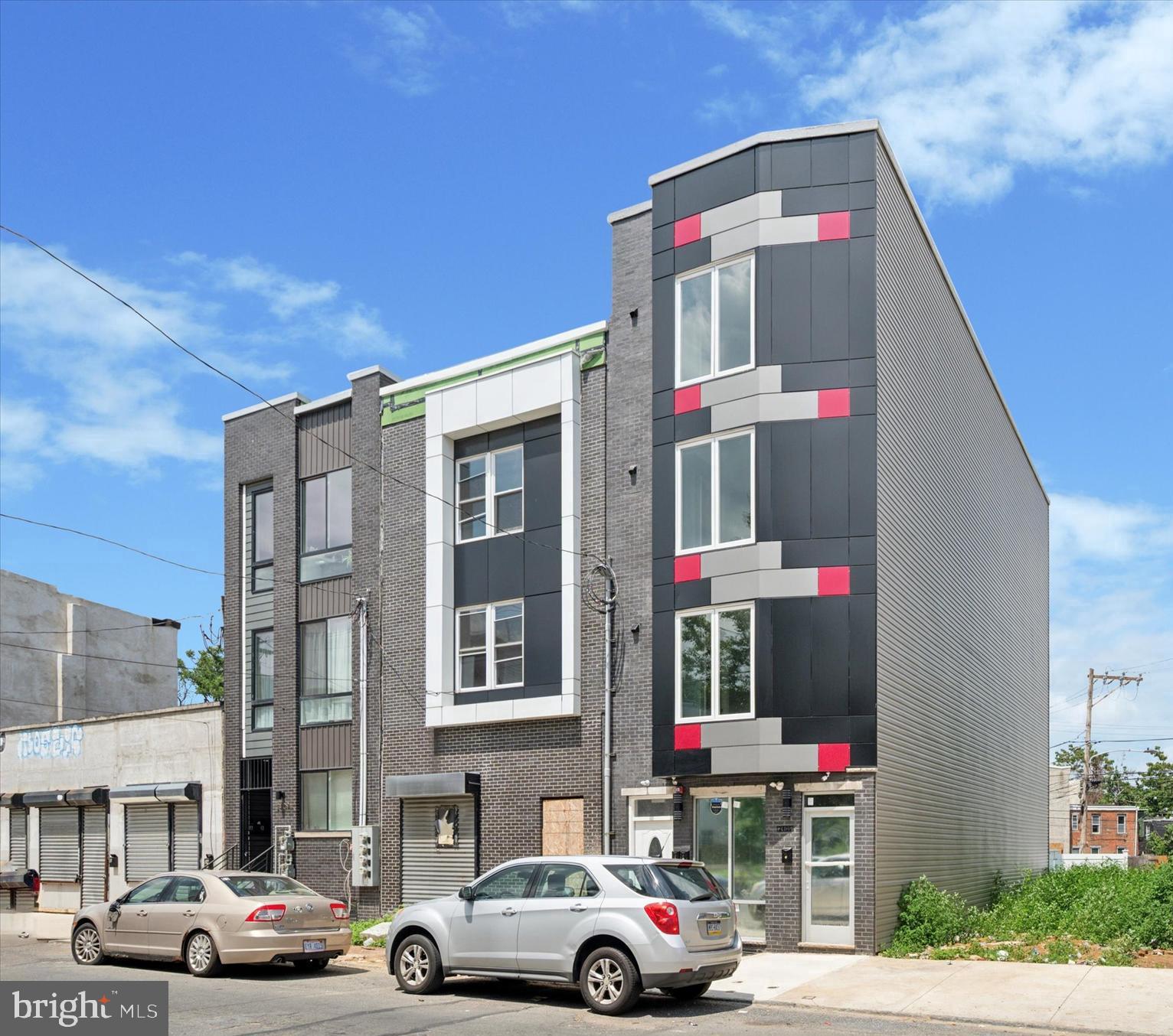 Introducing a newly constructed mixed-use triplex in the rapidly growing Brewerytown neighborhood offering the perfect blend of residential comfort and commercial opportunity. This 5,000 square foot building features three thoughtfully designed units, each with contemporary finishes and desirable layouts.
The ground-floor commercial space offers a sleek, open-concept layout ideal for retail, office, or studio use. Large windows bring in natural light, while the clean modern interior provides a flexible canvas for any business vision. With high visibility and foot traffic along Ridge Avenue, this storefront is an excellent opportunity for entrepreneurs looking to establish or expand in a thriving corridor. The store front is currently listed for $2500/month. The second-floor unit is a beautifully appointed two-bedroom, two-bath apartment designed for modern city living. The open kitchen features white shaker cabinets, granite countertops, a full stainless steel appliance package, and tile backsplash. Light wood-style flooring flows throughout, complemented by recessed lighting and oversized windows that bathe the space in natural light. Both bedrooms are generously sized, with the primary suite offering a private bathroom and ample closet space. This unit includes a washer / dryer and is listed for $1,700 per month. Spanning the third and fourth floors, the upper bi-level unit features four spacious bedrooms and four full bathrooms, ideal for larger households or shared living arrangements. Each bedroom enjoys access to a private or dedicated bathroom, and the open living and dining area flows effortlessly into a modern kitchen with high-end finishes. This expansive layout offers flexibility and privacy, making it a rare find in a prime urban location. A washer / dryer is included. This unit is currently listed for $2500/month. This new construction triplex combines premium finishes, functional design, and a location that continues to grow in popularity. A standout opportunity for both investors and tenants seeking modern living and business space in Philadelphia. Schedule your showing today.