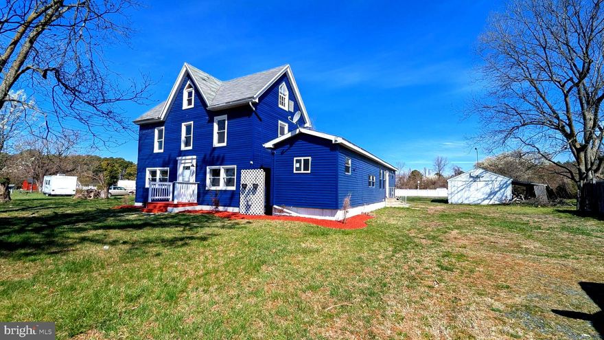 **Restored 1900 Traditional Farmhouse in Historic Deal Island, Maryland**

Discover the charm of this beautifully restored 1900 traditional farmhouse, nestled in the picturesque setting of historic Deal Island. This stunning home perfectly balances timeless character with modern amenities, offering a unique opportunity to own a piece of history. As you enter, you'll be greeted by the warm ambiance of luxury vinyl plank flooring throughout the  main level. The inviting living room features a cozy wood-burning stove, ideal for creating memorable gatherings during the colder months. The well-appointed kitchen provides both functionality and a touch of rustic charm, perfect for family meals and entertaining. Upstairs, find comfort in two generous bedrooms, each adorned with brand-new carpeting that adds a fresh and cozy feel. Two first floor bedrooms are perfect for an owner's suite and office, or additional living.  The large yard offers plenty of outdoor space for gardening, play, or simply enjoying the serene surroundings. With its beautiful restoration and expansive outdoor area, this farmhouse is a true sanctuary that captures the essence of rural living. Experience the peace and history of Deal Island—schedule your private tour today and make this charming farmhouse your forever home!