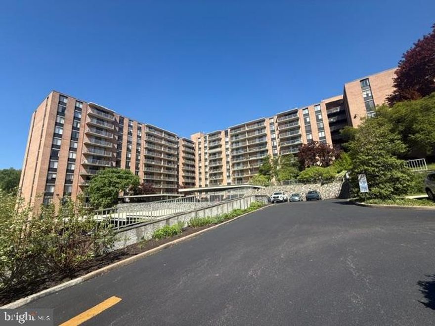 Nicely updated 1-bedroom Strath Haven condo overlooking the pool, ideally located on the 6th floor—no elevator needed. The updated kitchen features classic shaker cabinets, granite countertops, stainless steel appliances, and new hardwood flooring and fresh paint, all open to a spacious living room with a dedicated dining area and access to a private balcony. The bedroom offers updated carpeting, complemented by a refreshed hall bath. A convenient laundry room with stackable washer and dryer completes this move-in-ready home. Enjoy comfortable condo living with great views and thoughtful updates throughout with easy access to the pool, just outside the side door.    Included is a separate storage unit.