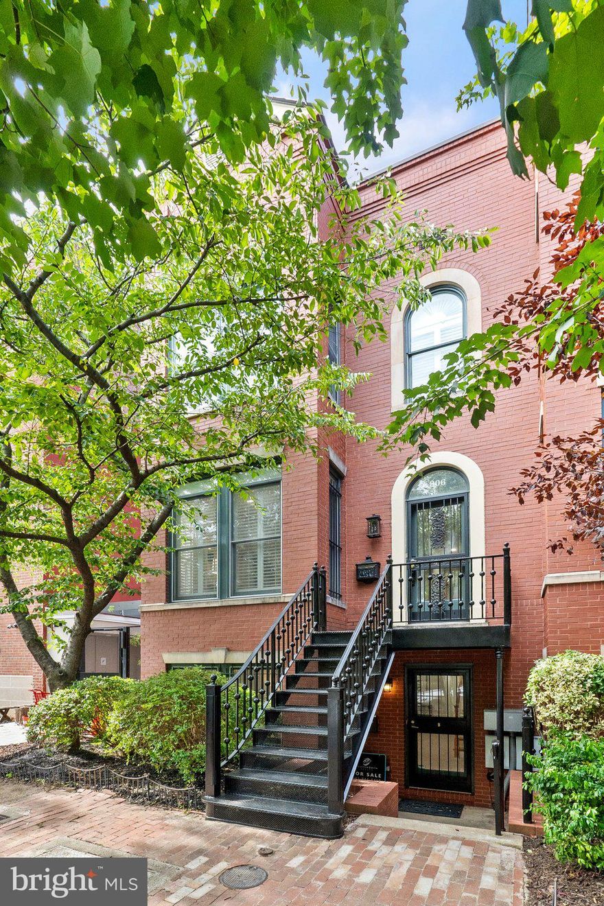 Welcome to this exquisite, sun-drenched, end-unit townhouse in a prime Capitol Hill location with over 3,100 finished square feet. A true gem, this home perfectly blends modern construction, built in 2001, with soaring ceilings, modern amenities, and classic Capitol Hill charm. Upstairs, you will find a renovated (2024) 3 bedroom, 2.5 bath suite spanning over 2100 square feet, including a brand new kitchen with Bertozzini appliances, elegant ice white shaker cabinets, and luxurious quartz countertops, as well as a separate butler’s pantry. The main level flows wonderfully, with a large formal living room with a gas fireplace and built-in cabinetry into the expansive formal dining room. The kitchen flows right into a flex living space and a spacious patio. The primary bedroom is expansive with a walk-in closet and luxury bath. The additional two bedrooms are sizable, connecting via an updated Jack and Jill bath. Downstairs, you’ll find a fully-equipped 2 bedroom, 1 bath English basement with both front and rear entry, perfect for a rental, last rented at $2,700/mo., nanny-suite, or extra living area. Two, reserved, off-street parking spaces included. Convenient location - blocks from the U.S. Capitol, Supreme Court, and Library of Congress. Enjoy the city life, being close to Lincoln Park, Stanton Park, Eastern Market, and the heart of Capitol Hill. Don't miss this perfect blend of historic charm and modern convenience in an unbeatable location! Schedule your tour today!