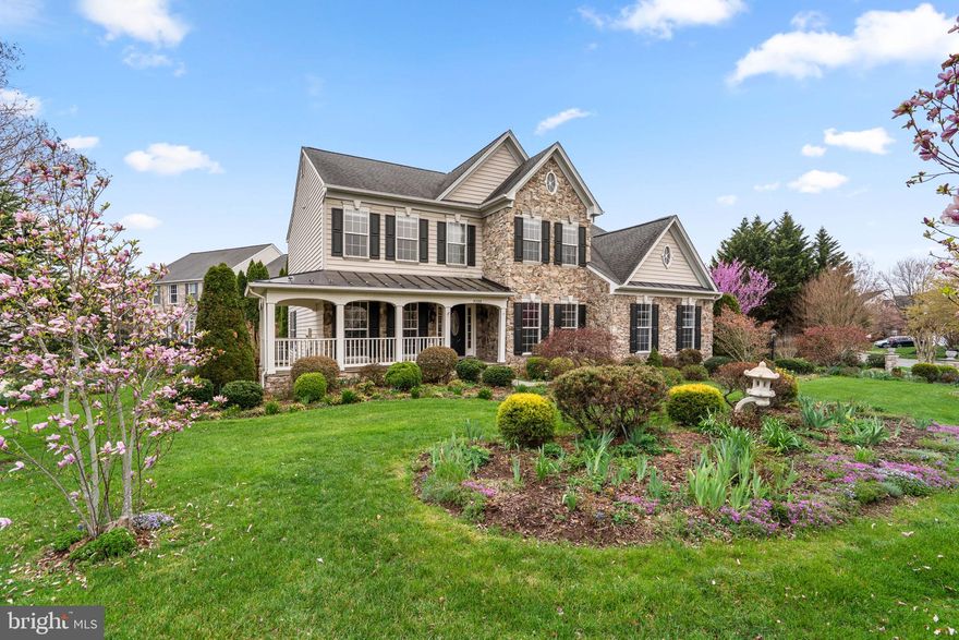 Welcome to the Haymarket Westmarket Community, where this stunning residence sits on a premium corner lot surrounded by natural beauty. This exceptional 5‑bedroom, 3‑bath home offers approximately 3,600 square feet for upper two levels of thoughtfully designed living space, showcasing elegance, comfort, and extensive custom upgrades throughout. A main‑level primary suite provides the ease of single‑level living, complemented with direct access to the three‑car garage.

Step inside to an impressive foyer with transom windows, creating a bright and welcoming first impression. The main level flows effortlessly into formal living and dining areas, an open kitchen, and a spacious family room centered around a cozy fireplace. 

The chef’s kitchen is beautifully appointed with 42” custom maple cabinetry, upgraded granite countertops, a large center island, gas cooktop, upscale appliances, and abundant storage. The open‑concept layout connects the kitchen and breakfast area seamlessly to the great room, making this home perfect for entertaining. From the great room, step outside to a designer deck overlooking a custom brick patio, fountain, lush landscaping, and garden—an outdoor retreat ideal for gatherings or quiet relaxation.

The upper level features a luxurious primary bedroom retreat with a spa‑inspired bathroom offering a soaking tub, separate shower, and ceramic tile flooring. Three additional generously sized bedrooms, a large, shared bathroom, and a dedicated laundry room complete this level.

The partially finished lower level expands the living space even further, may add an additional flexible room ideal for a home gym, office, hobby space, or guest accommodations. Rough in for full baths, and wet bar, insulation, electric are ready for finishing the basement.

Too many newer features to list, must see inside, roof, HVAC, additional 3rd garage, deck, patio, ponds, furnace AC, Heat pump, battery backup sump pump, appliances, all wired shelves, some maple/birch shelves, crown molding....

The beautifully landscaped yard provides endless opportunities for outdoor enjoyment, while the community offers scenic walking trails and tranquil ponds, allowing you to come home to nature every day. Conveniently located near shopping, dining, hospitals, and major commuter routes, this home delivers both serenity and accessibility. Your dream home awaits—don't miss this opportunity!