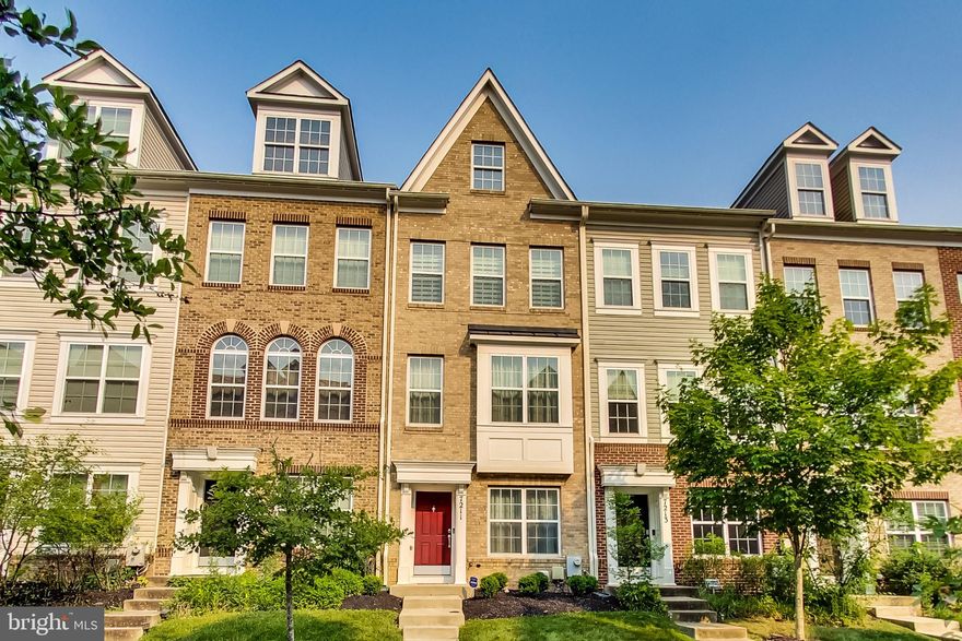 This bright and spacious townhome has a garage, a main-level room that can be used as a den/office/flex space/bedroom, 2 en suite bedrooms on the top level, and beautiful light fixtures throughout. Get ready to view the serene primary bedroom suite with custom paint, Versace wallpaper, a walk-in closet, and a separate water closet in your en suite bathroom. The community amenities include 2 beautiful clubhouses with a gym, a party room with a catering kitchen, a pool, a lake with walking trails, and 2 playgrounds. The MARC train, coffee cafe, nail salon, and food trucks are all a stone's throw away. Yes. Food trucks... and the food is yummy! Don't be shy: please feel free to inquire about furniture that can convey