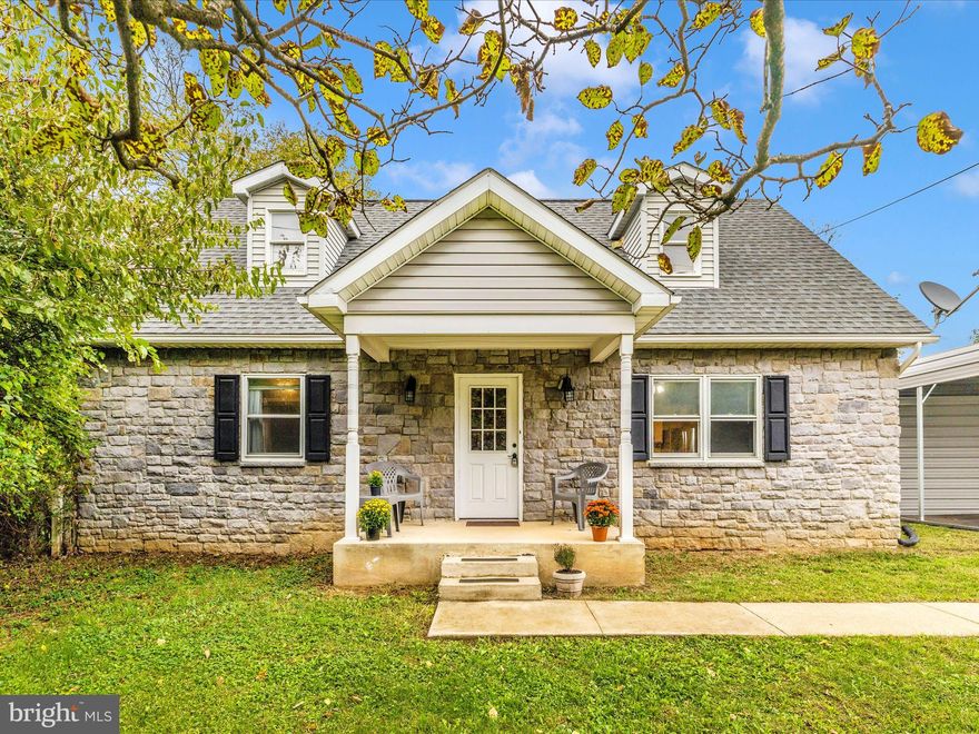 Welcome to this adorable cottage-style cape cod.   Just minutes from Shepherdstown, you'll find plenty of paved parking, and a cute front porch.  Inside you have one-level-living with kitchen, primary bedroom and full, updated bath (including oversized walk-in shower) along with washer and dryer all conveniently located on the main floor.  The kitchen offers plenty of counter space, stainless steel appliances and a kitchen window over the sink looking out on your nearly one full acre!  Upstairs, there are 2 spacious bedrooms and another full bath!  The basement offers two finished rooms, a storage/utility room and another full bath.  That's right!  A full bath on every level!  Your yard offers plenty of level ground for whatever you want to do with it.  Fence it, add a pool, up to you!  There are beautiful giant rock fomations you could include in a lovely rock garden.