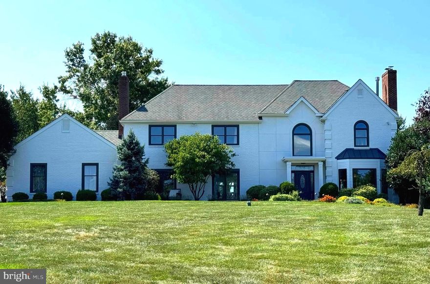 Professionally photos will be uploaded soon. Significant upgrades have been completed  since current ownership. Welcome to 10 Avondale Drive, an exquisite estate set upon a 1.77-acre premium lot, capturing a sense of seclusion and breathtaking Jericho Mountain views. 
A home suited for multigenerational living, providing everything needed for privacy offering comfort and space with the convenience of an effortless commute. Located on a quiet cul-de-sac in a sought-after neighborhood within the Council Rock School District.  A designer-curated exterior renovation has reimagined the front facade with stunning white-painted brick. This choice lends the estate a bright, timeless and an immediate sense of 'newness' from the moment you pull into the newly paved driveway.
The main level characterized for versatile living arrangements and bright, functional space. The open concept kitchen featuring a Wolf double oven, gas rangetop, Sub Zero refrigerator, a sizable center island flows to a window-filled family room with a vaulted ceiling boasting serene mountain views. The formal living room offers a quiet, sophisticated space to gather in front of the gas fireplace.  A versatile room adjacent to the kitchen features built-in shelving and cabinets, suitable for use as a home office,playroom... The dining room with custom woodwork is perfectly situated just off of the kitchen. 
Uniquely prepared for long-term comfort featuring a main-level bedroom setting the perfect balance of luxury and practical design with a brick fireplace, front of the home patios, a wardrobe closet, LED recessed lighting, custom woodwork and built-ins. Accessibility was a priority in the redesign as a full bath on the main level is located just outside this suite alongside a spacious closet, new sliding doors - one equipped with a ramp and the private elevator providing access to the lower level.   
The first floor laundry room boasts new Carrera marble tile, elevated w/d, a new utility sink and direct access to the garage or backyard. Make note of the generator, house humidifier, water softener, filtration systems and classic pocket doors throughout.
The home’s private elevator provides effortless transit to the lower level au paire suite which includes a bedroom, full bathroom, kitchenette, a large walk-in closet, plumbed for another laundry center, an additional bonus room and more.
The upper level primary suite that acts as a true getaway with its remote-controlled gas fireplace and rich hardwood floors and two walk in closets. This private retreat extends outdoors to a personal serene, sunset deck. The primary suite serves as a true sanctuary, featuring a spa-inspired primary and bright bathroom designed for relaxation with dual vanities, a deep soaking tub, a new glass enclosed shower and a discreet, private water closet. 
Three additional bedrooms on this level, two feature their own dedicated full bathrooms, and the third using the newly renovated hall bathroom, new flooring throughout and ensuring privacy for all residents. 
For added convenience, the beautiful, renovated hallway bathroom has already been plumbed to accommodate a potential second-floor laundry center.
The property sits on almost two acres with a fenced in backyard, a 24 zone two year new irrigation system  fire pit, fountain and professional landscaping. The additional, separate fenced in pool area includes a salt water, heated 28,000 gallon in gorund swimming pool with a new variable speed, energy efficient pump. 
The clean and newly painted, three car garage features 90 amps in the sub panel, automatic garage door openers and floored climate controlled attic space with a new attic access folding stairs.
If you’ve been looking for a move-in-ready home in Upper Makefield, this is it. 
Every detail has been designed to support a seamless, modern lifestyle with 5 - 6 bedrooms incorporating clean and fresh new upgrades.
Easy commute to New York, Princeton and Philadelphia.