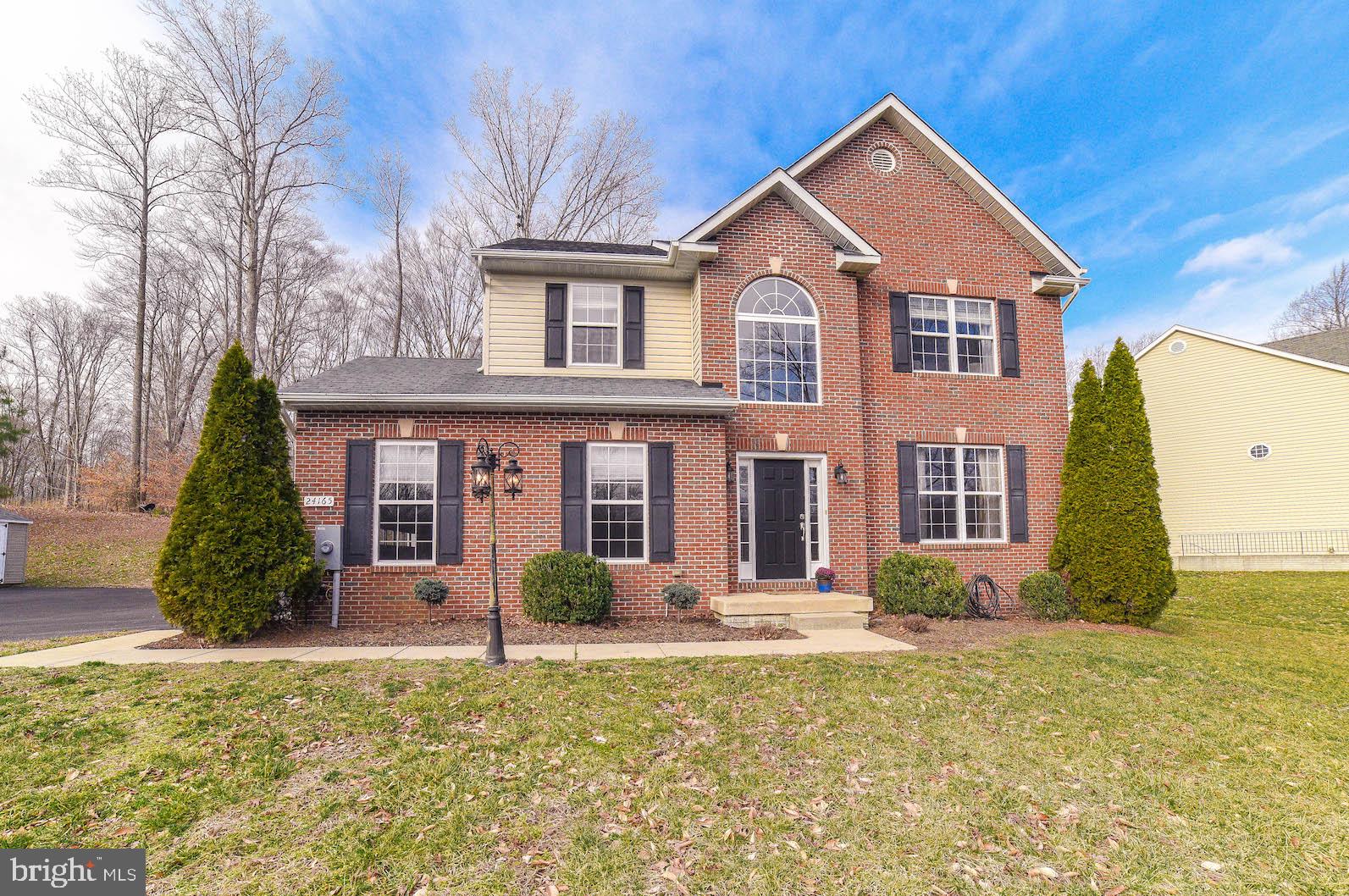 BIG BOLD BEAUTY! This spacious home has so much to offer! Fall in love with the open layout... Kitchen with center island overlooks family room with fireplace. Formal dining room & living room make entertaining easy. Main level flooded with natural light. Large master bedroom w/vaulted ceilings, ceiling fan & walk in closets. Master bath boasts soak tub, dual vanities & separate shower. 3 additional spacious bedrooms on upper level. Large finished rec room w/ bar & room for media rm or exercise room. Backyad patio will be the perfect place for summer BBQs or relaxing in the sun! Open level backyard with playground that conveys. 2 car garage and driveway leave plenty of room for parking. This house will sell itself...just open the door!