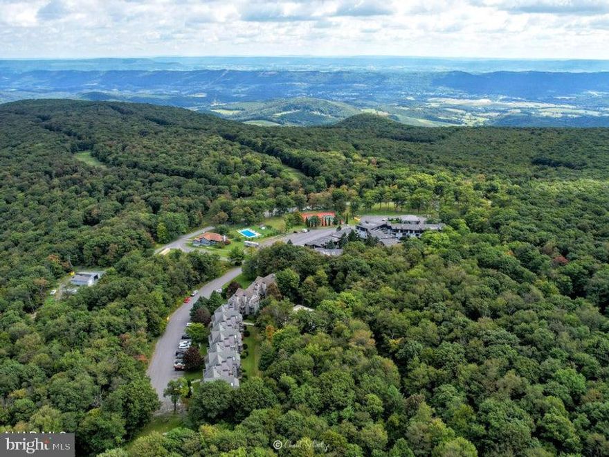 1 Bedroom 1 Bathroom with Built in Bunks Beautifully renovated 3rd floor condo in the Allegheny Mountains at Blue Knob All Seasons Resort has everything you need. Fully furnished. Updated countertops, flooring & stainless appliances and so much more. Walking distance to indoor pool/hot tub, outdoor pool and The Club House Bar & Grille. Blue Knob is the 2nd highest mountain and highest skiable mountain in Pennsylvania! In addition to an array of winter activities, Blue Knob also has a full-service all seasons Conference Center for weddings and events, they also offer golf, swimming and multitude of trails for hiking, running, and mountain biking.  $258.00/ Mo HOA fee includes: pools, hot tub and gym area, tennis and pickle ball courts, building, property maintenance & garbage. This unit is currently an Airbnb. *Additional fees apply for conference center, Golf and Skiing