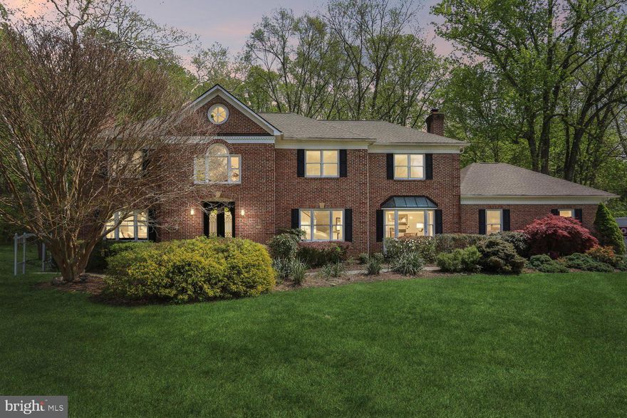 Nestled in the serene Rivers Edge subdivision, this stunning Colonial offers an exceptional blend of elegance, comfort, and natural beauty. A true sanctuary from the moment you arrive.
From the street, outstanding curb appeal sets the tone. Step inside and discover over 6,000 sq feet of beautifully finished living space featuring hardwood floors throughout, a smart floor plan with natural flow, and four fireplaces that create warmth and character in every season.
The updated classic kitchen is a chef's dream, boasting new cabinetry, upgraded countertops, a center island, and ample space for casual dining. Whether you're hosting a dinner party or enjoying a quiet morning, this home is designed for the way you really live.
The flexible floor plan offers remarkable versatility. Five bedrooms grace the upper level, while the main level features a room perfectly suited as an office or additional bedroom, conveniently located across from a full bath. The walk-out lower level — fully finished with multiple entrances, a wet/dry bar, and endless possibilities for recreation or relaxation — includes an additional bedroom and full bath, bringing the total to 6 bedrooms (main level bed/office could be the 7th!) and 6.5 bathrooms.
A three-car attached garage, a 5-years-new roof, double-pane windows, and thoughtful finishes throughout round out the interior appointments.
But perhaps the most memorable feature of this home is what lies just beyond your back door. Backing to a lush canopy of trees on an expansive 2.24-acre lot, this property feels like a world away — offering complete privacy, serene wooded views in the back, and a park-like setting that transforms your patios and deck into a peaceful retreat for morning coffee or evening gatherings.
And the location delivers even more.  Private neighborhood trails connect directly to the C&O Canal National Historical Park towpath — miles of scenic beauty for walking, cycling, and exploring, right at your doorstep.
This is not simply a place to live. It is a place where elegance meets nature, and where every detail has been thoughtfully considered. Welcome home.